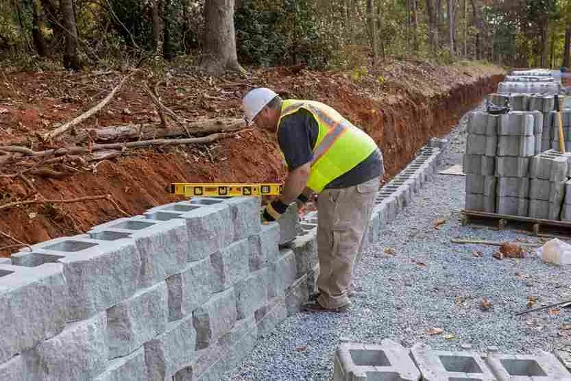 Can a Retaining Wall Be Installed on Top of a Concrete Patio? What Winnipeg Homeowners Need to Know