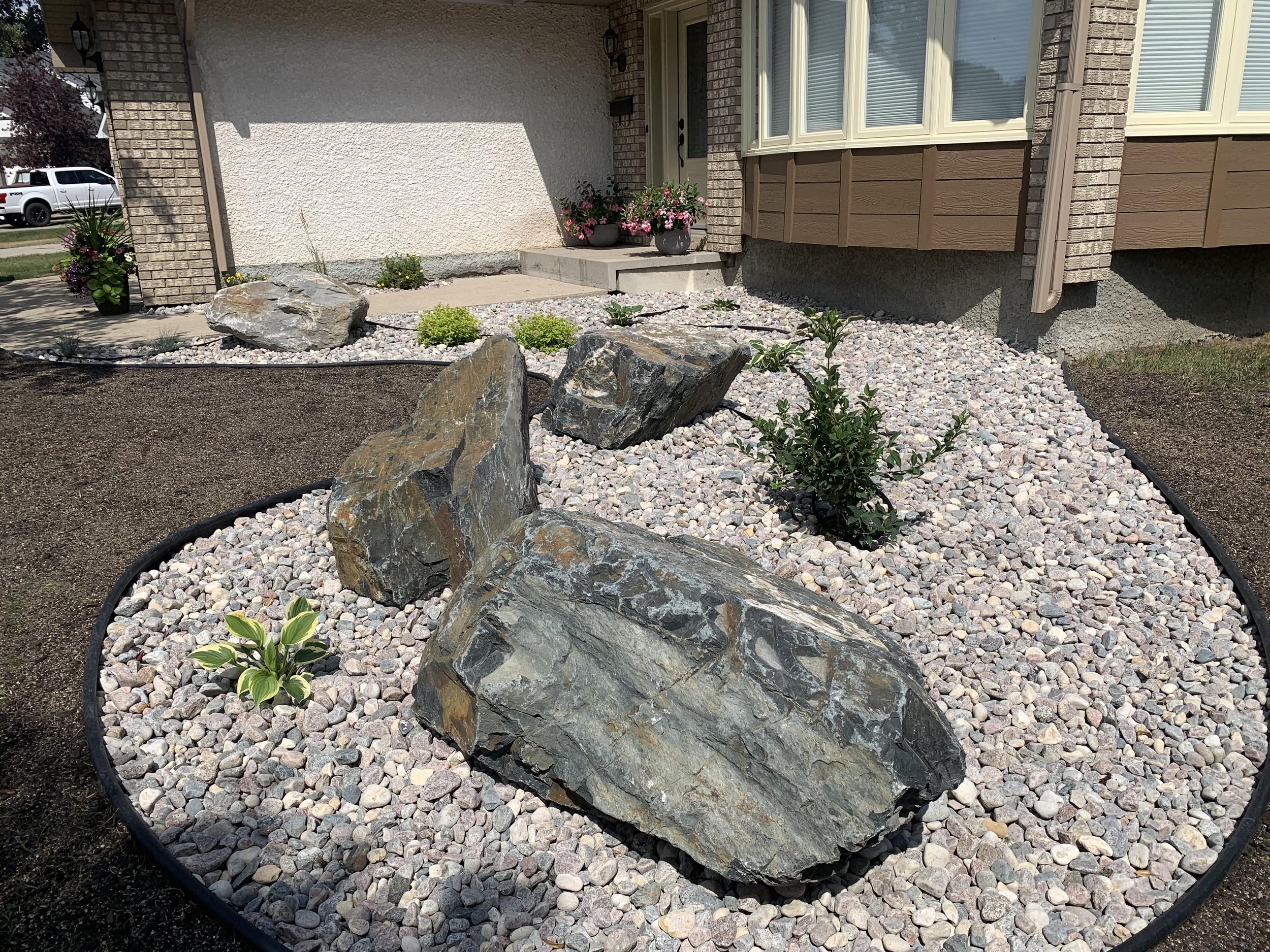 Rock Bed Installation in Winnipeg | Bulger Brothers Landscape