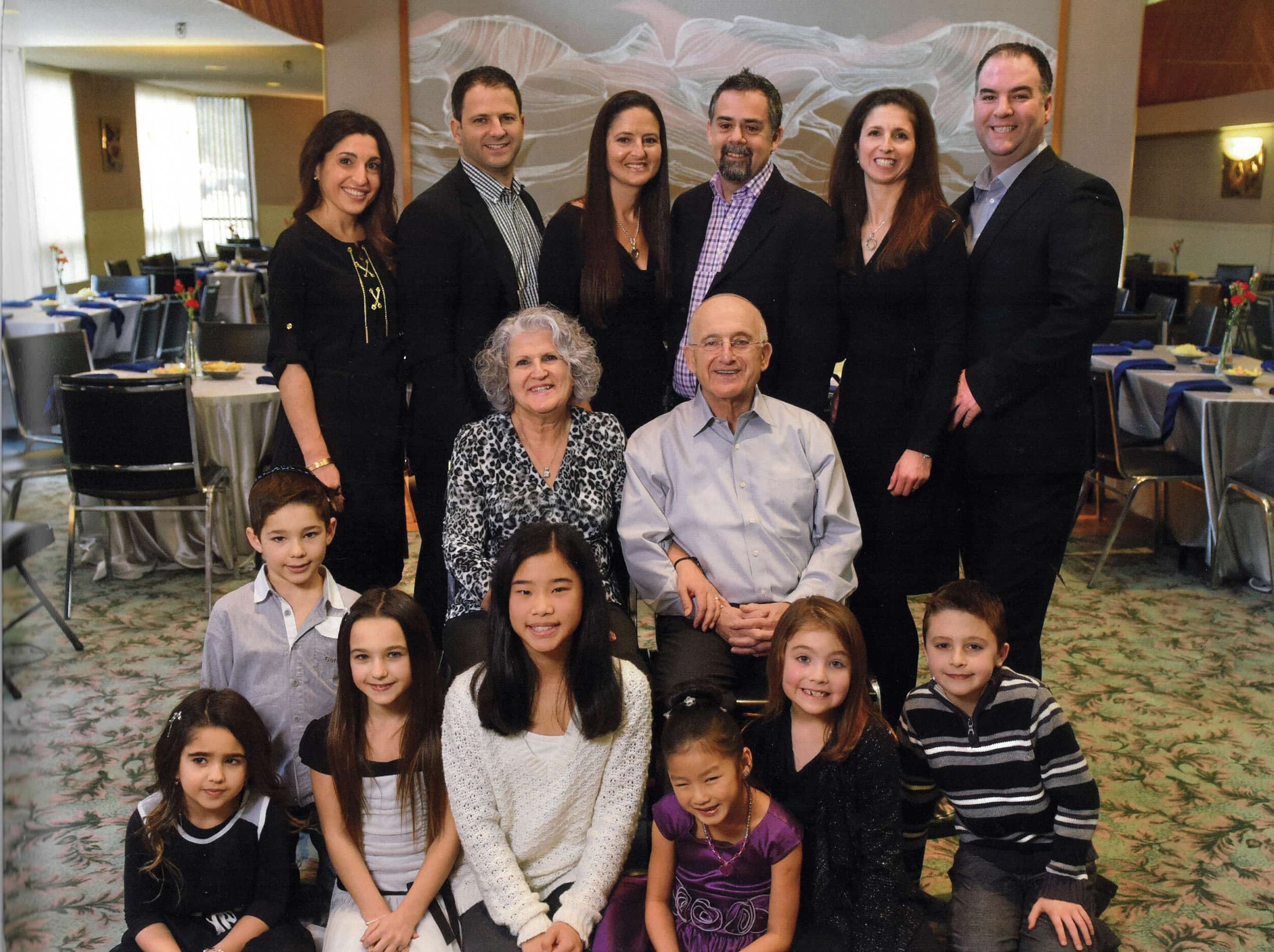 Gershon and Jane with their grown children and grandchildren