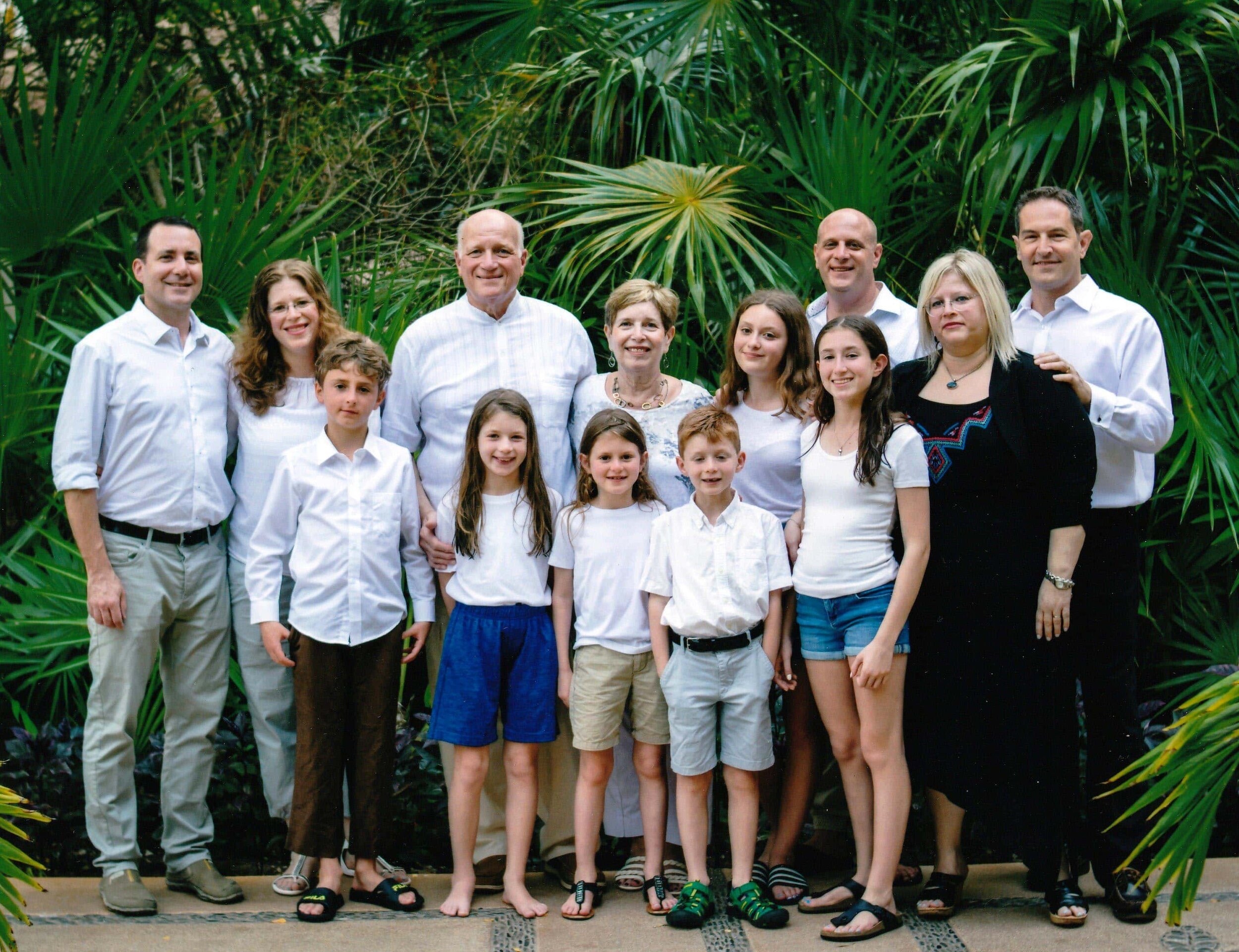 Beny and Hope with their grown children and grandchildren