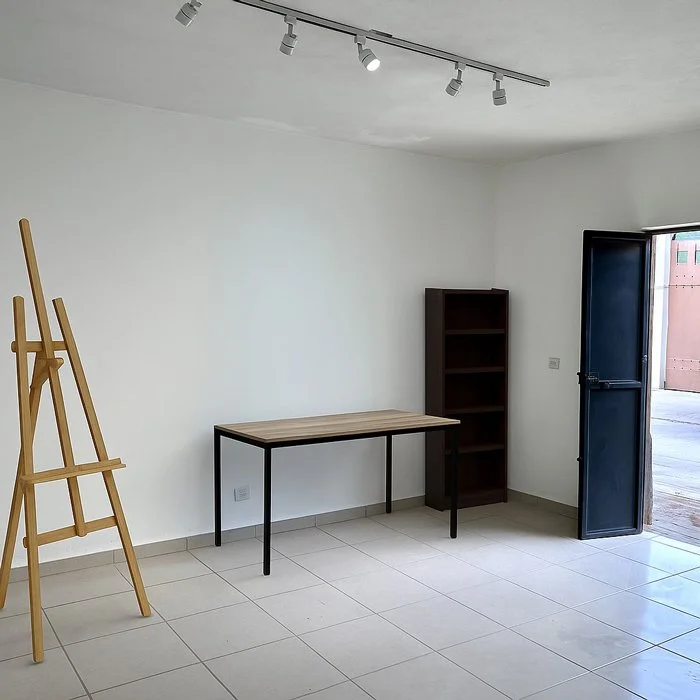 Offers a door to inside the atrium and outside