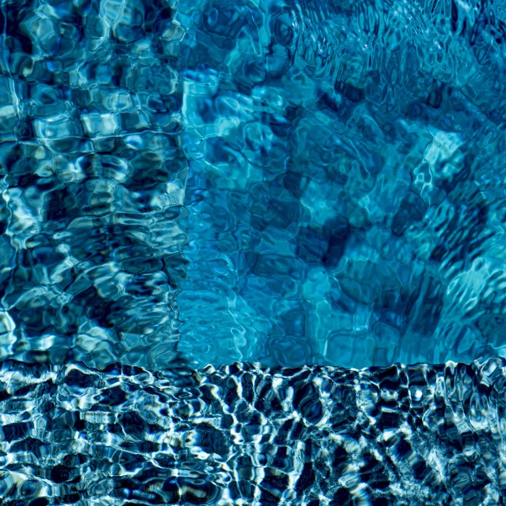 Modern abstract pool photograph featuring layered blue water reflections and shifting light, produced as a glossy acrylic limited-edition print.