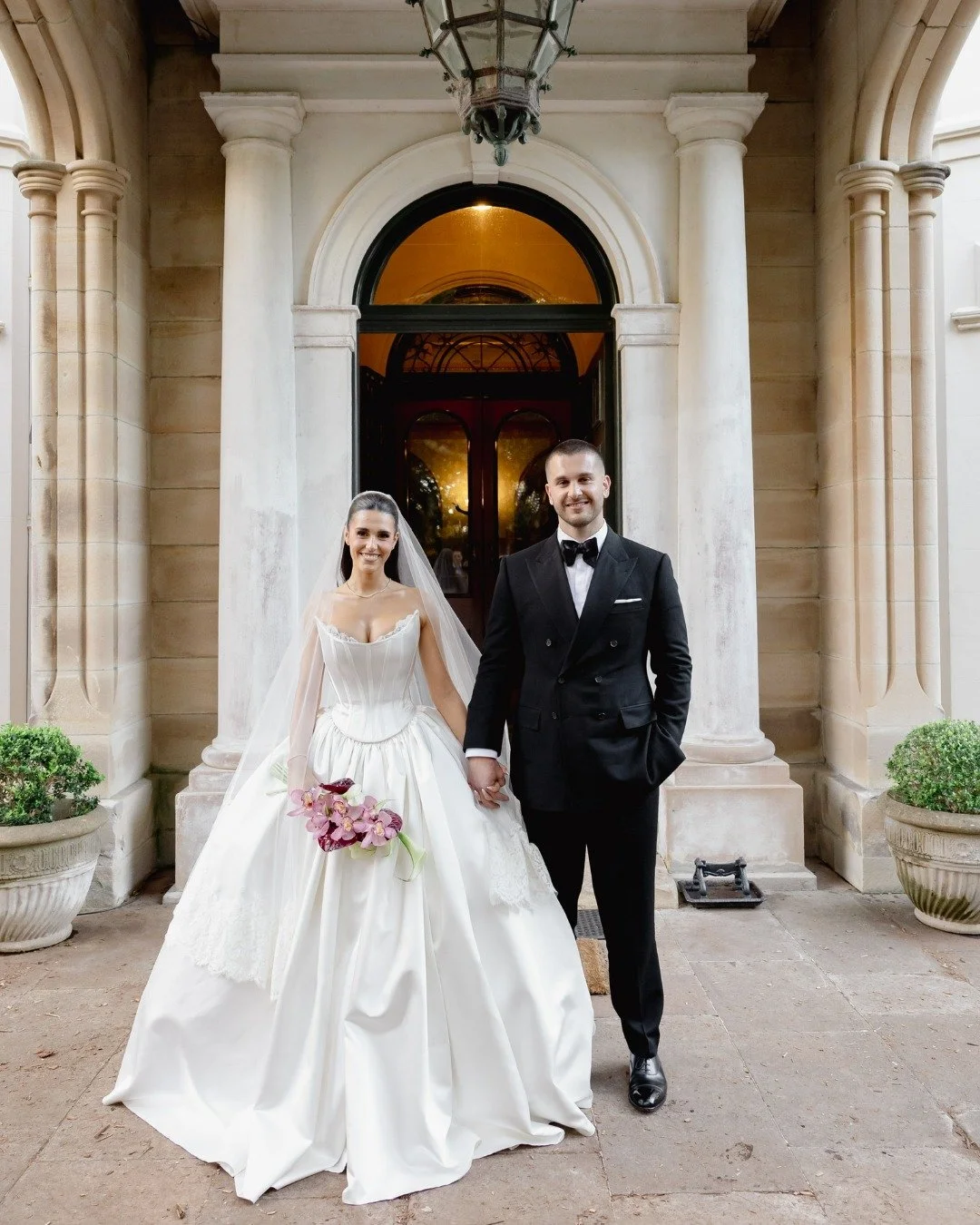 Stephen &amp; Kiara. 
Moments from their incredible wedding. Stephen looking dapper in a double-breasted two-piece, crafted in black barathea cloth by @hollandandsherryapparel 

Stunning photography by  @erinnealephotography 

#SydneyGroom #DoubleBre
