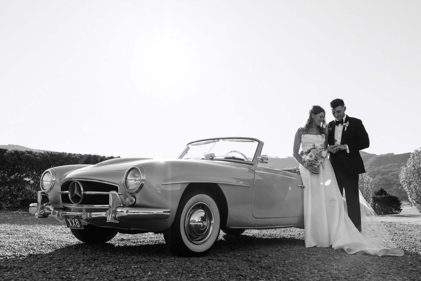 Classic style for an unforgettable moment.
The groom, Travis, in a timeless tuxedo crafted in black Barathea cloth by @dugdalebrosandco finished grosgrain shawl lapel.

#SydneyTailor #BespokeGroom #WeddingTuxedo #BespokeTuxedo #GroomStyle #VintageCar