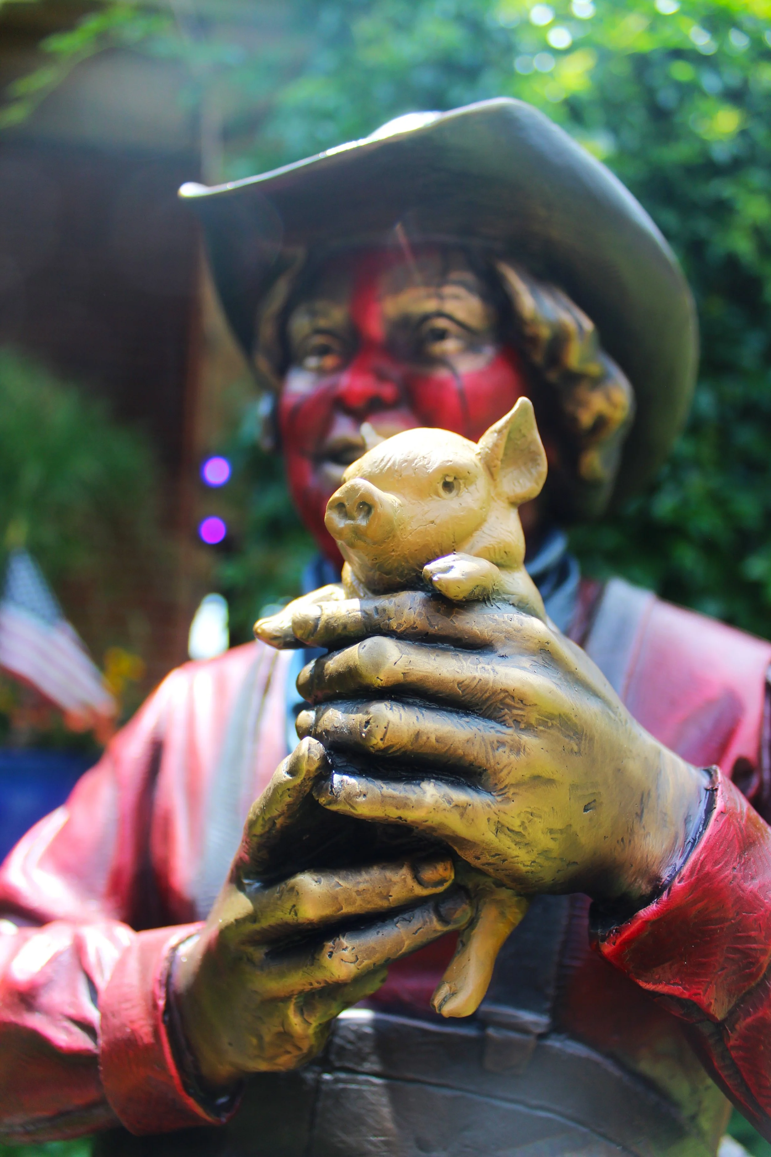 Bronze sculpture pig by sculptor Joel Turner Quail Dobbs animal public community