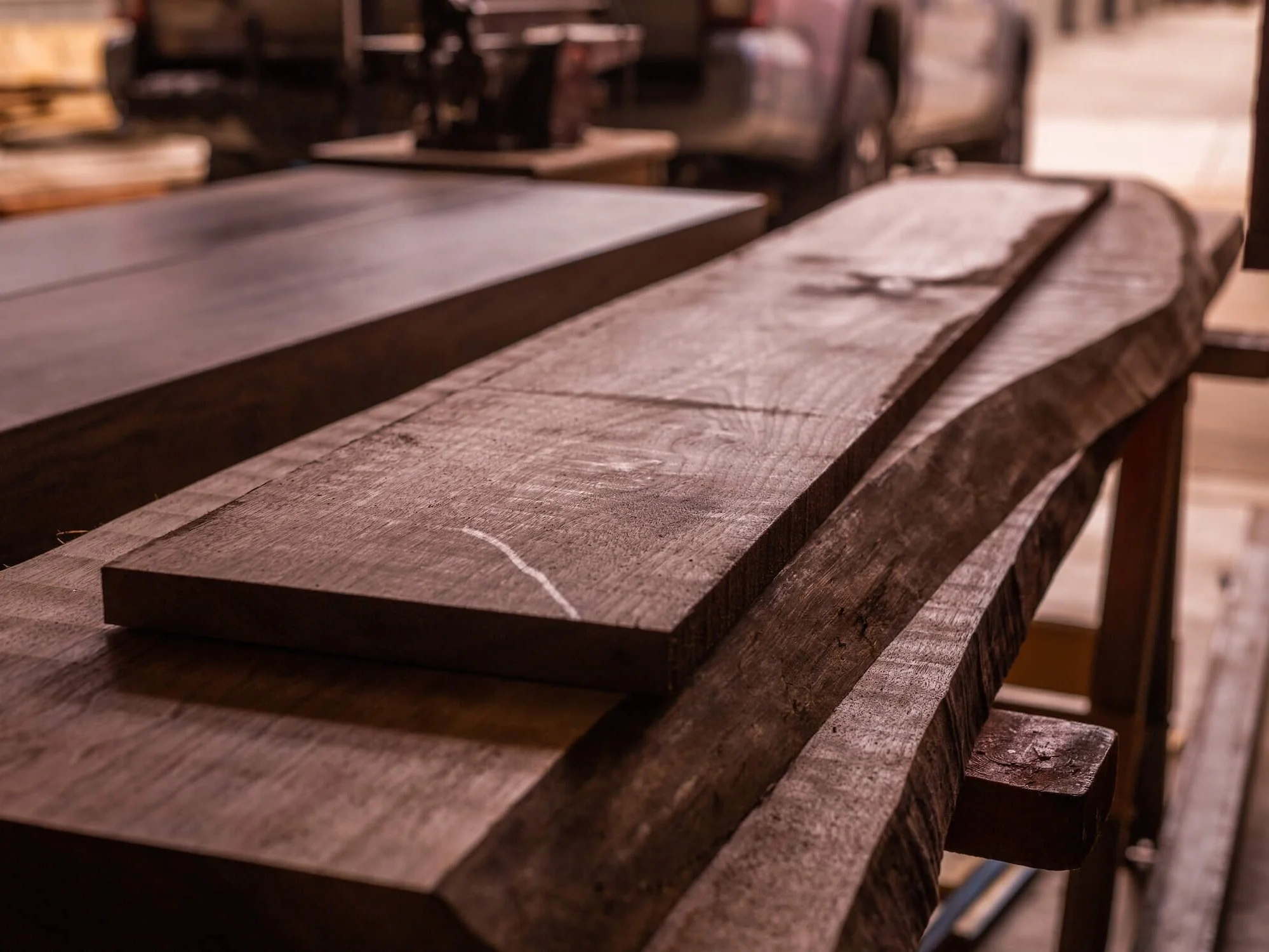 Stack of walnut boards for custom dining table project