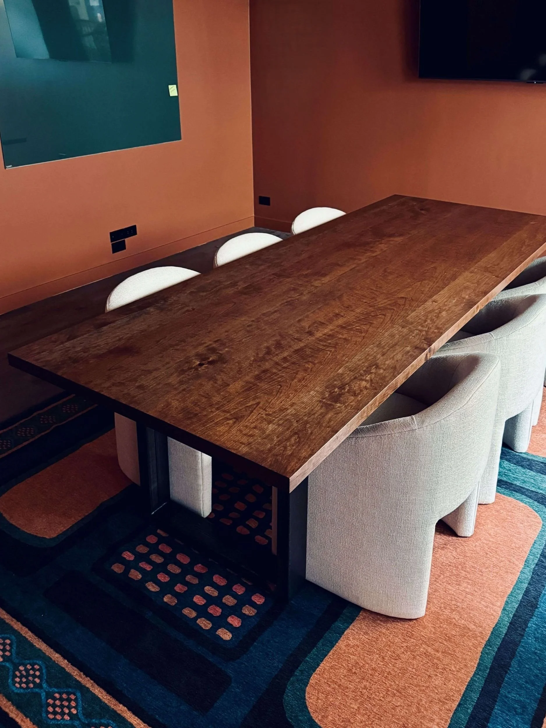 Dark cherry conference table for architecture firm in Golden, CO