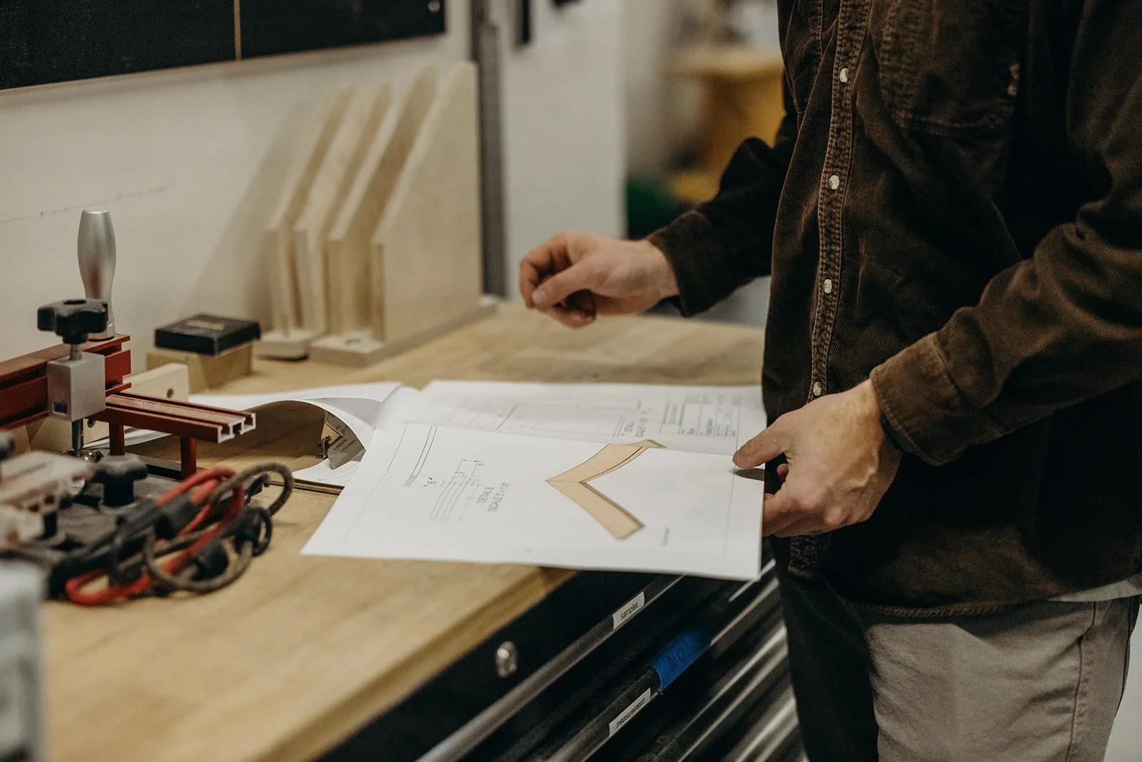 Shop drawing review in the Dust & Spark studio