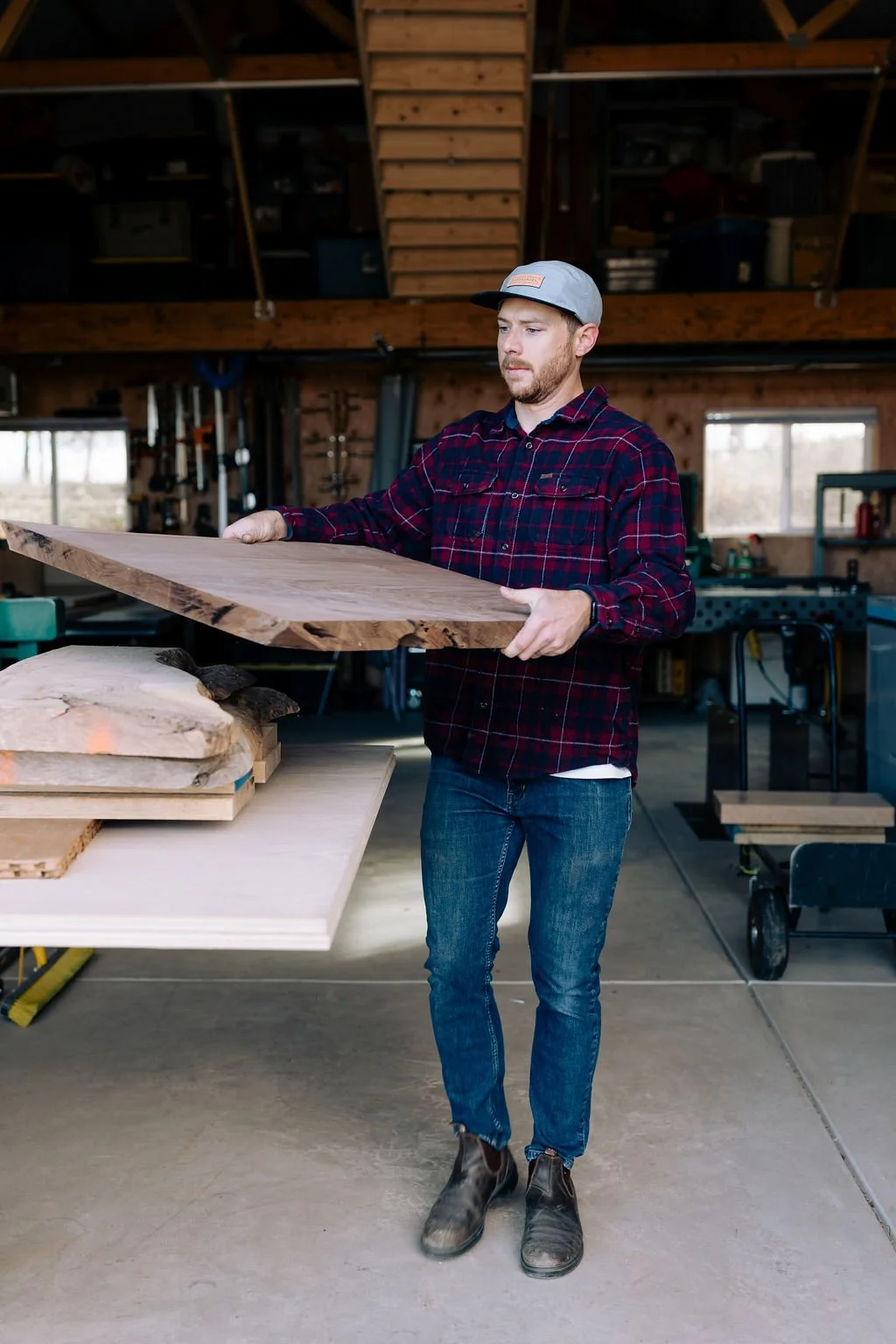 Scott selecting wood species for custom furniture consultation
