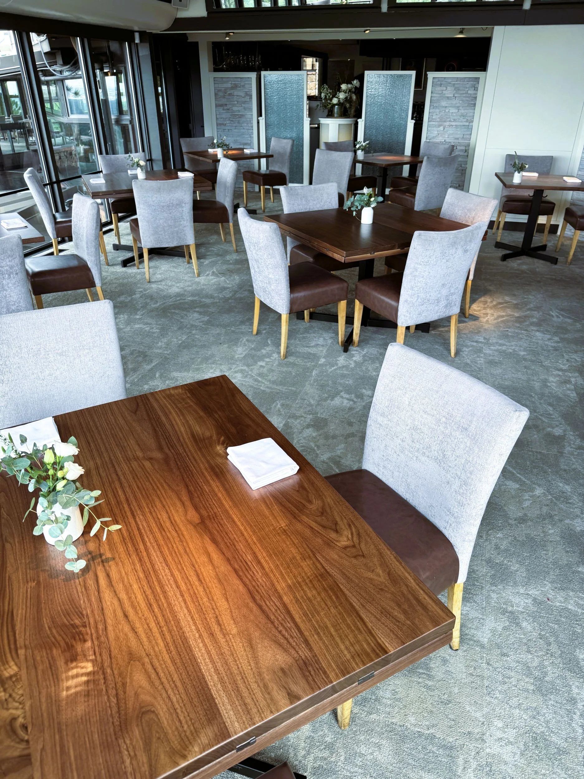 Main dining room walnut tables at Flagstaff House restaurant