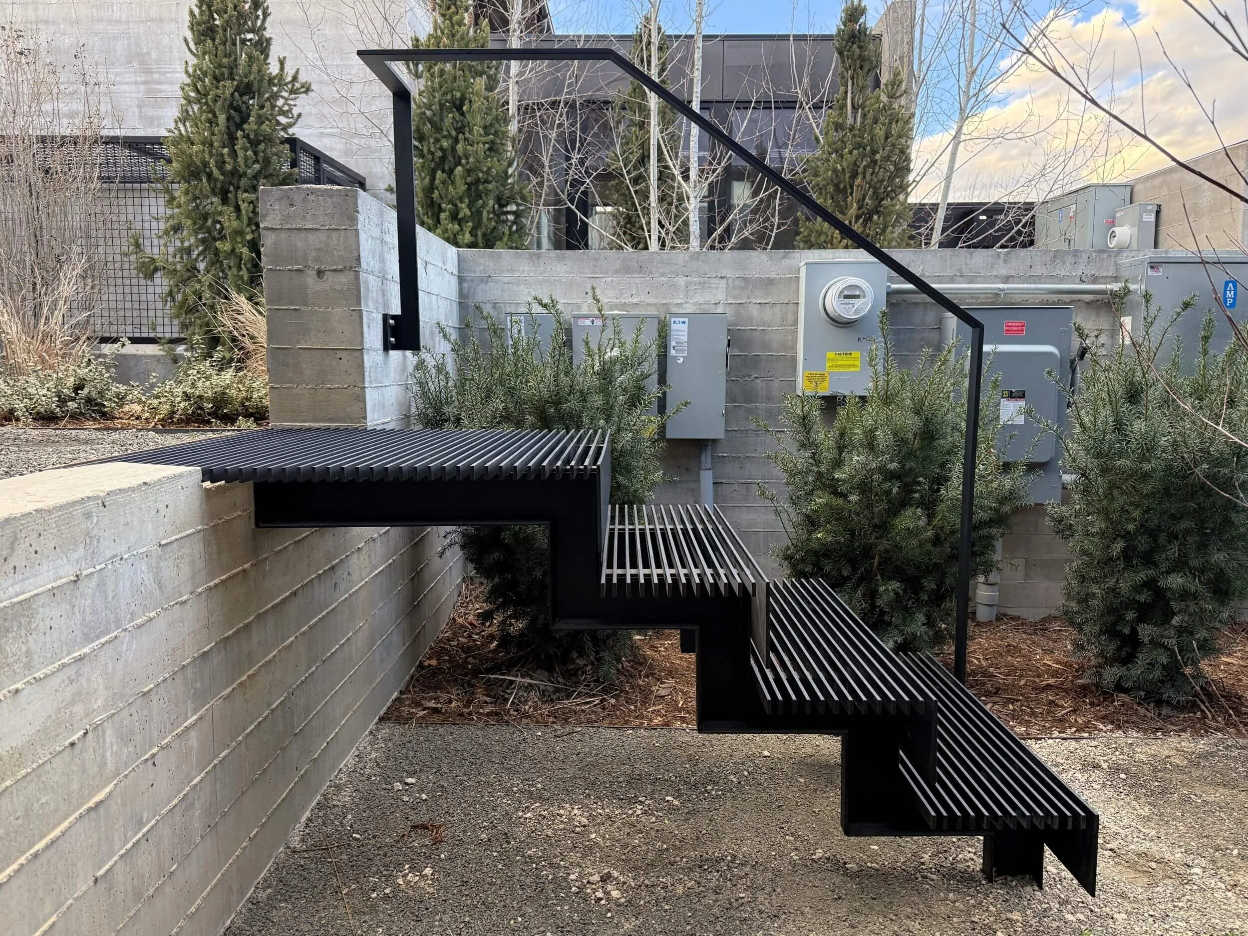 Modern steel staircase and grab rail at a custom home in Boulder, Colorado