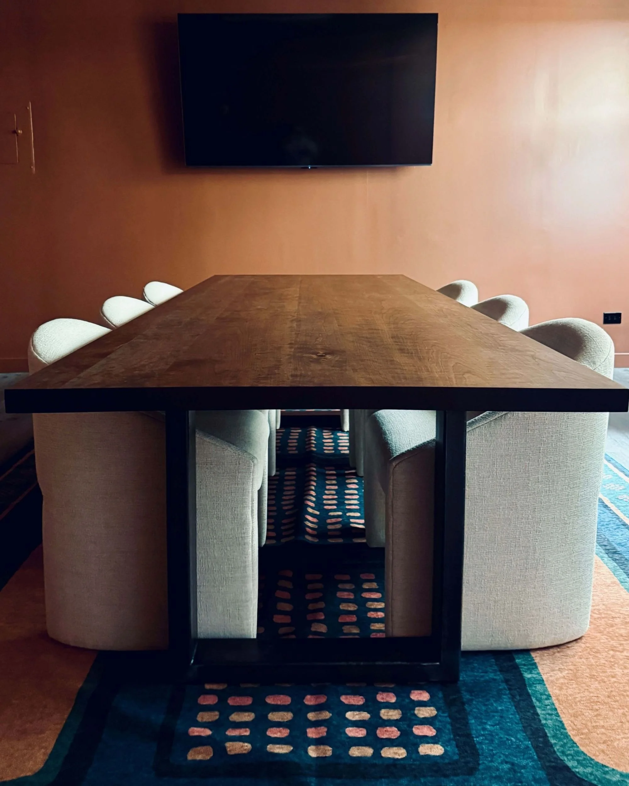 Dark cherry conference table for architecture firm in Golden, CO