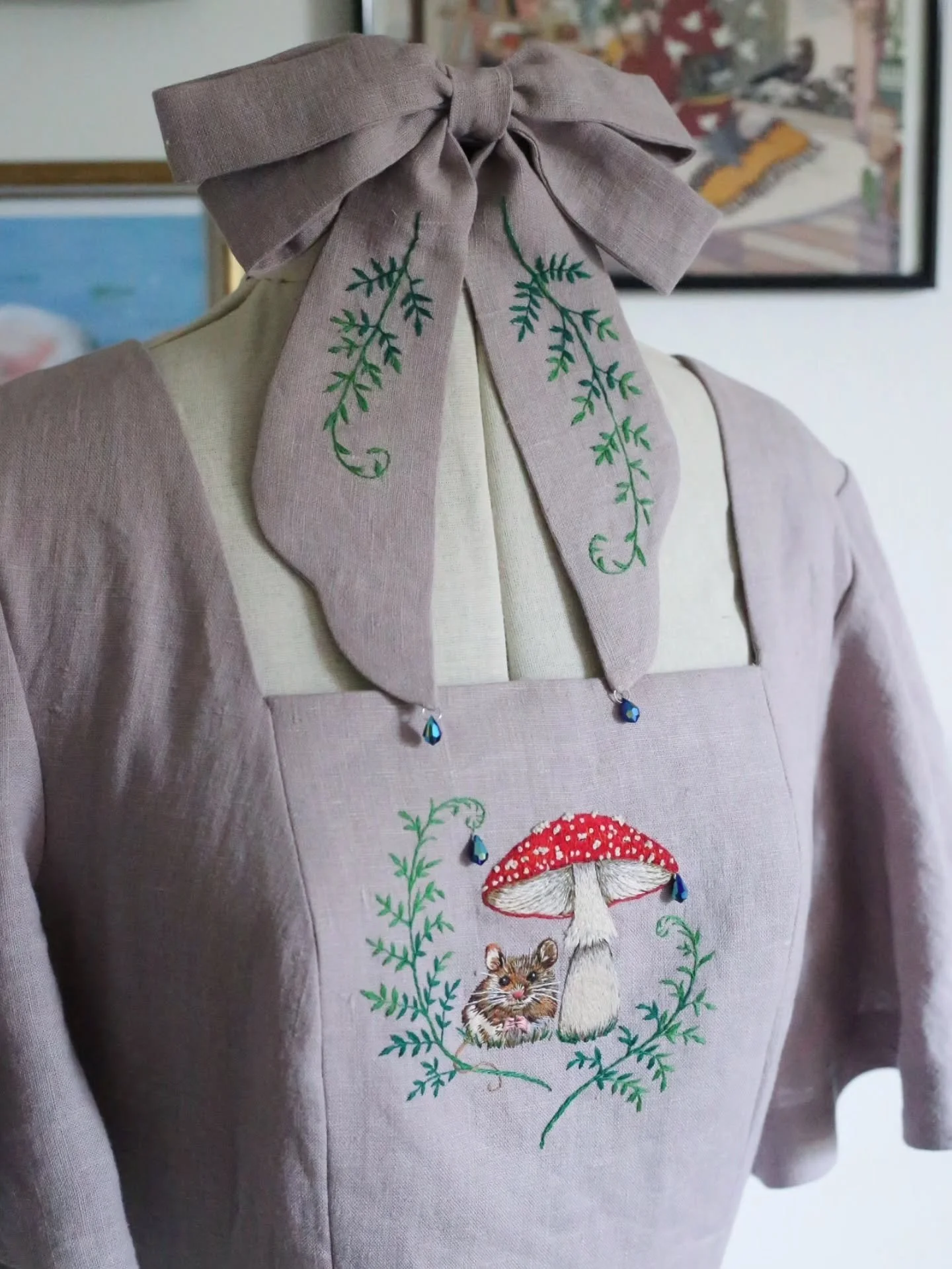 This customer asked me to create her a dress that feels like a cozy rainy day 🌿🐀🍄 🌧 

I'm really happy how this embroidery turned out! I added some sparkly blue water drop beads to the hairbow and dress 🌧 
.
.
.

.
.
.
#hobbitcore #smallbusiness