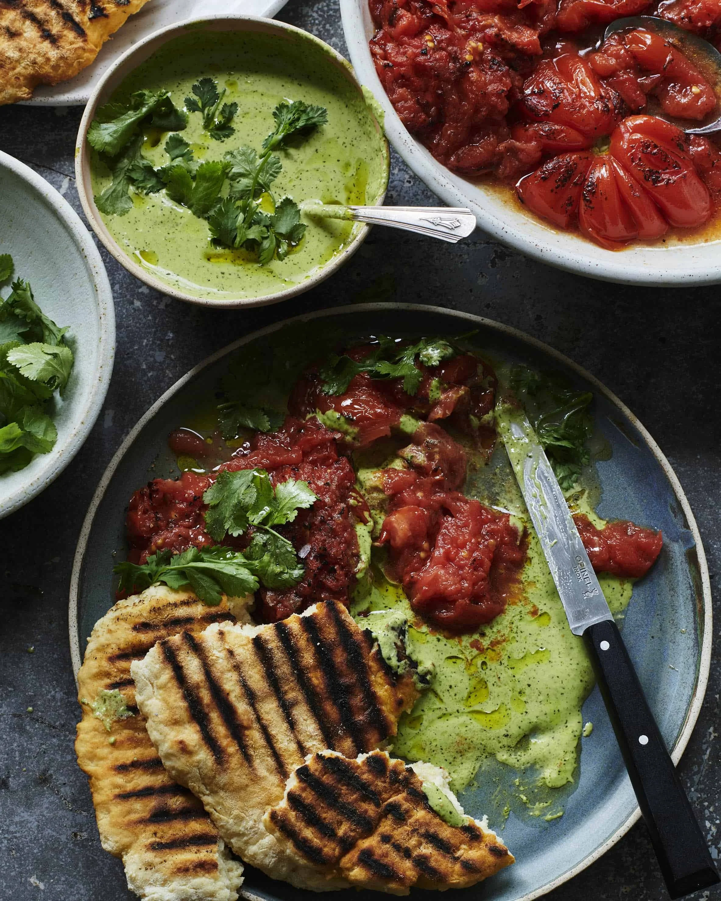 Grilled tomatoes with aji verde (Peruvian green sauce) & yoghurt