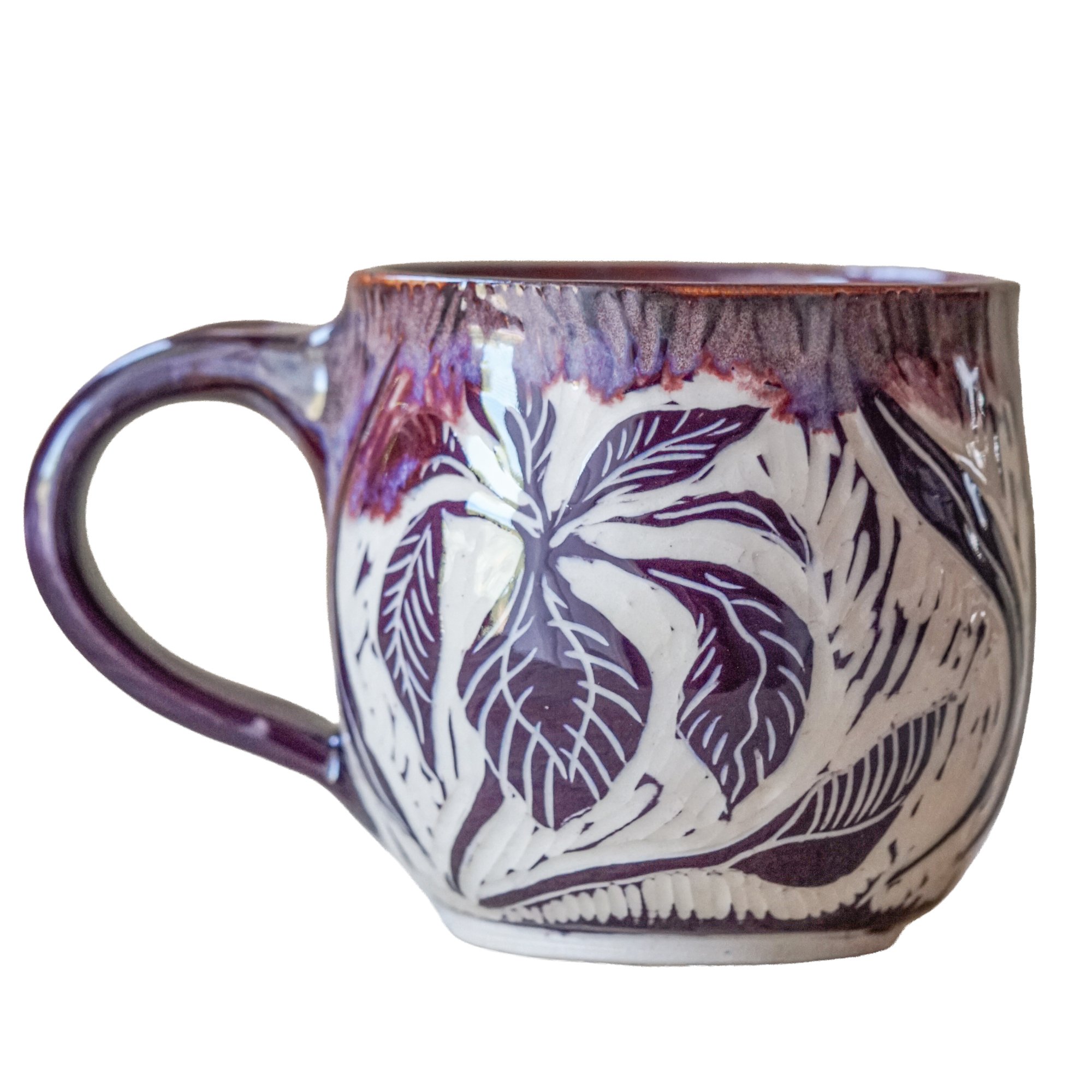 Iris mug - £50. Crafted using the traditional sgraffito carving technique. These pieces are handmade and unique, with similar mugs available from 7th November.