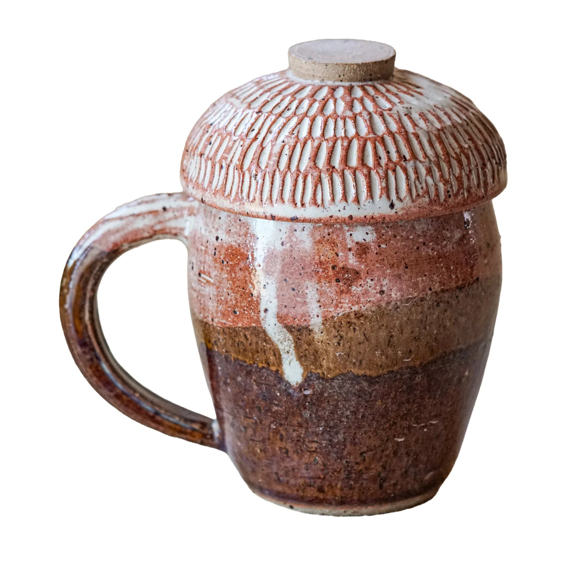Acorn Mug -£59. Perfect for keeping your brew warm in winter, with a lid that doubles as a biscuit dish. These pieces are handmade and unique, with similar mugs available from 7th November.