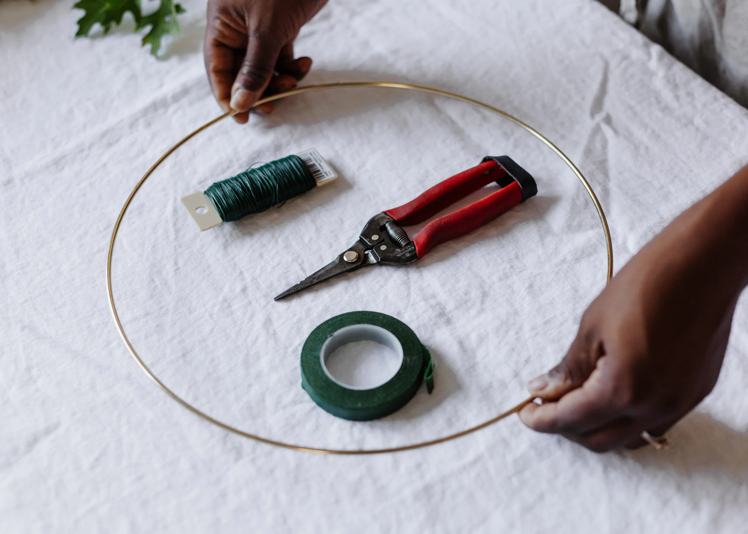 If you have purchased our wreath kit, it will include a 14in brass ring, floral tape and floral wire. You will need a good pair of floral clippers or garden shears.