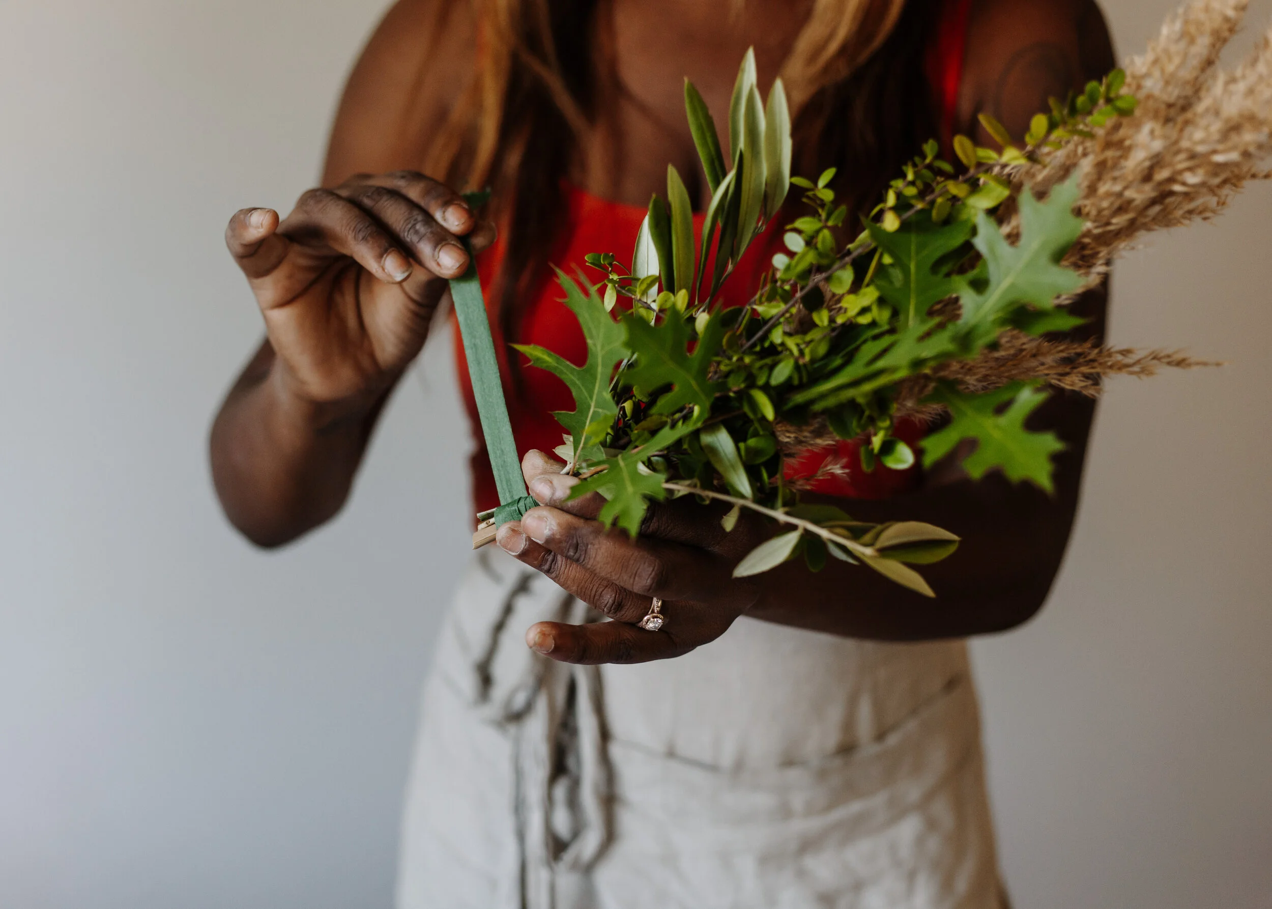 As you start making your bundles, place them on your ring (not attached), just to see what it looks like. If you like the look of them first of all, but also if you like their thickness. Alternating design makes for a more textural, eclectic finish look. I prefer mixing things up rather them making the same bunches throughout. But this is your creation, you get to make it your own. Have fun with it!