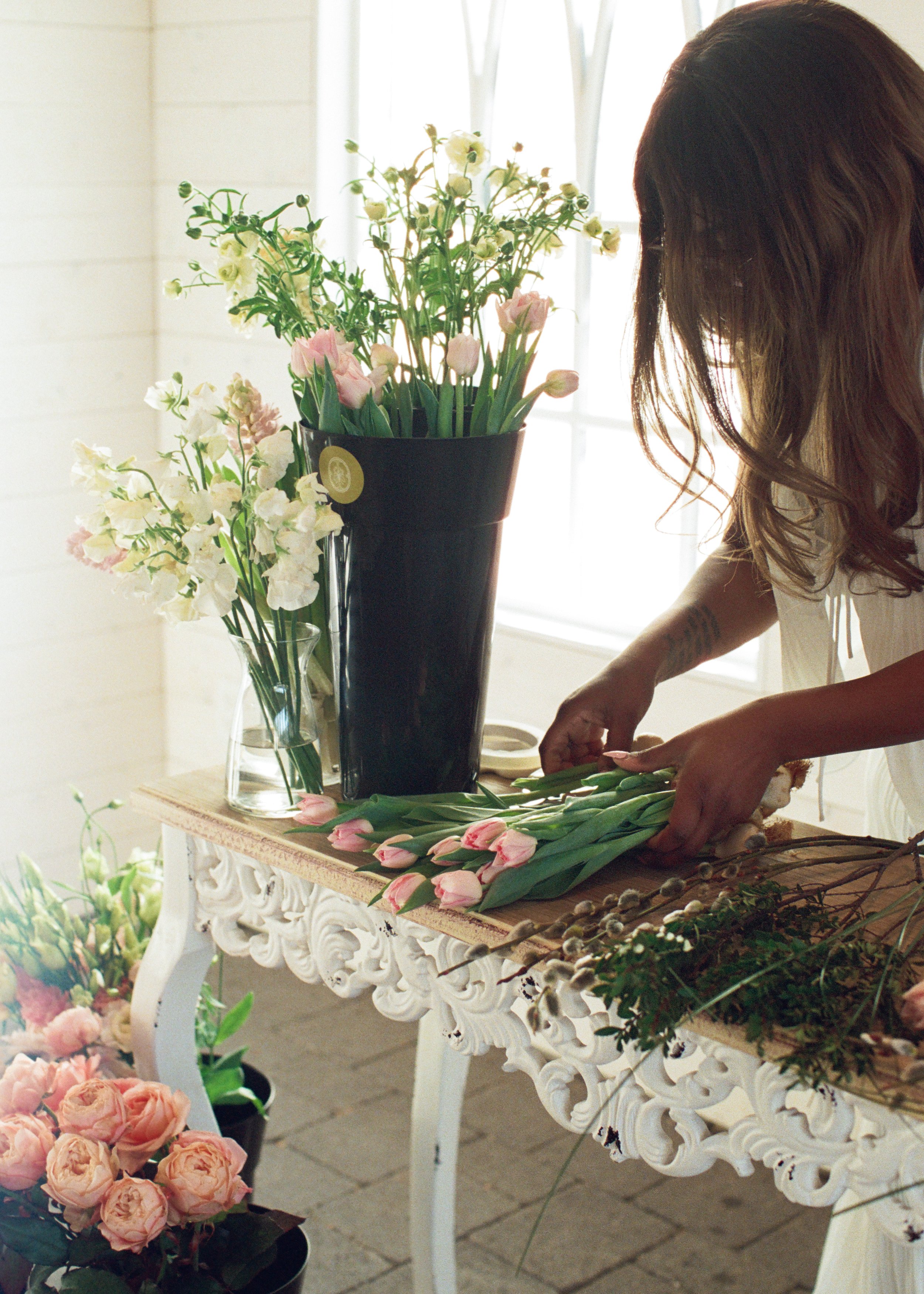 Floral designer working with locally grown flowers in Canada