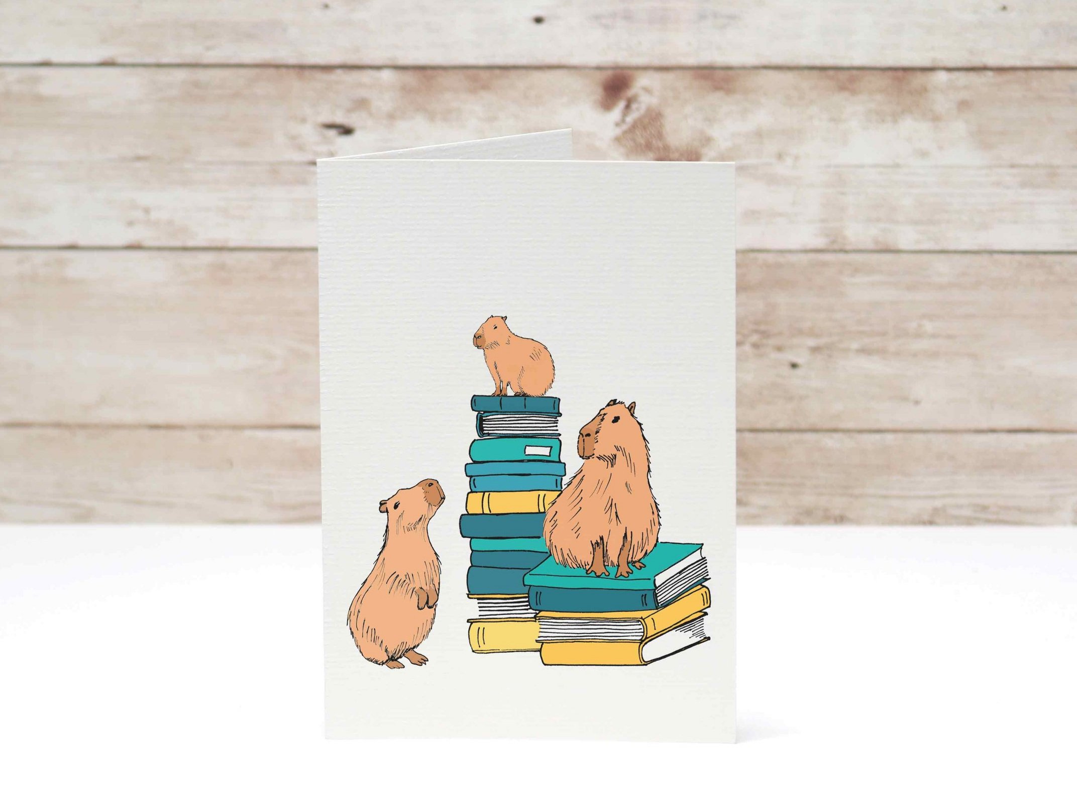Capybara_and_books_greeting_card.jpg