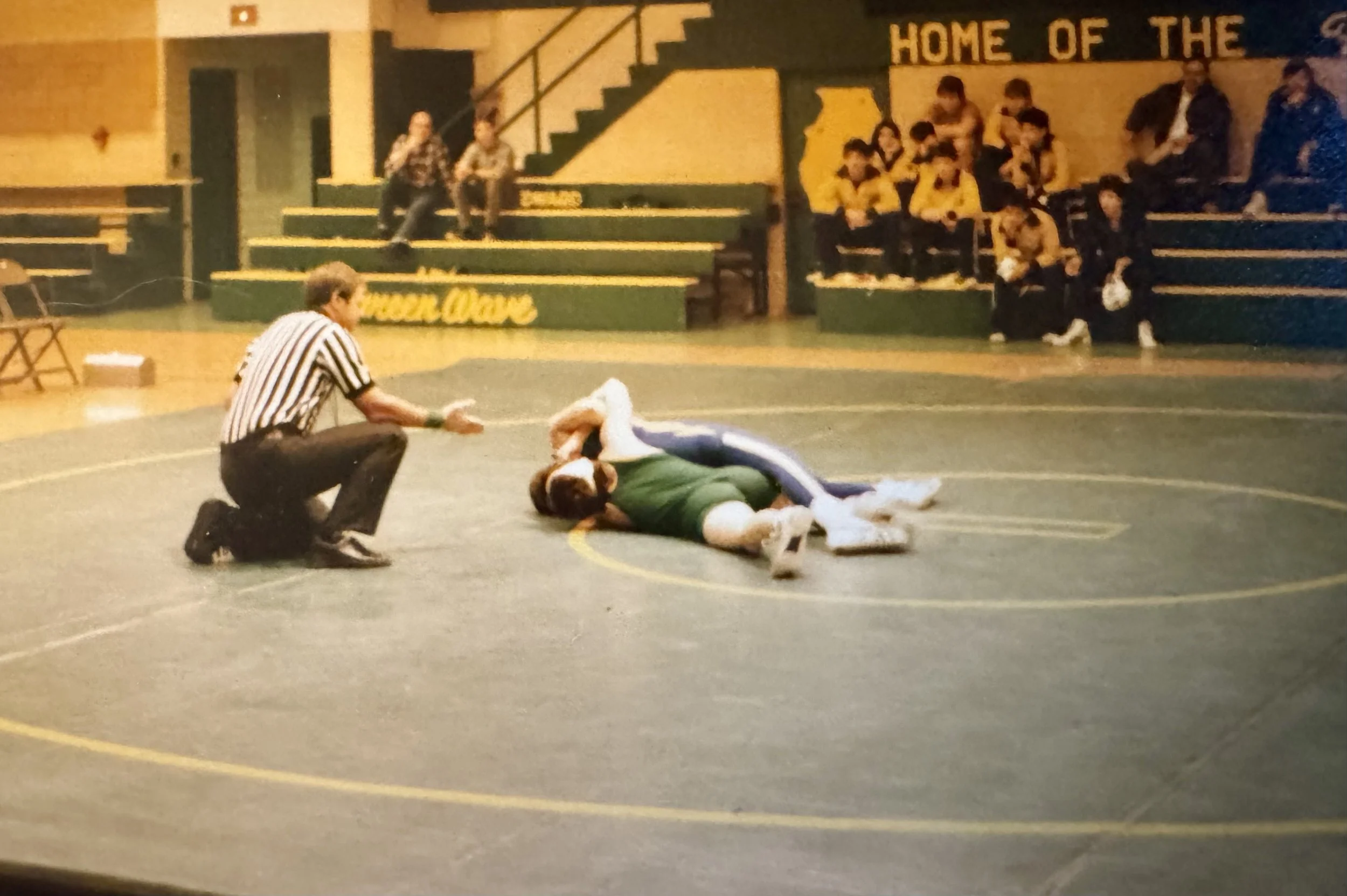 While Stef excelled in athletics (shown here in one of his wrestling matches, that despite the photo, he actually wins), he chose to follow his heart and pursue the arts.