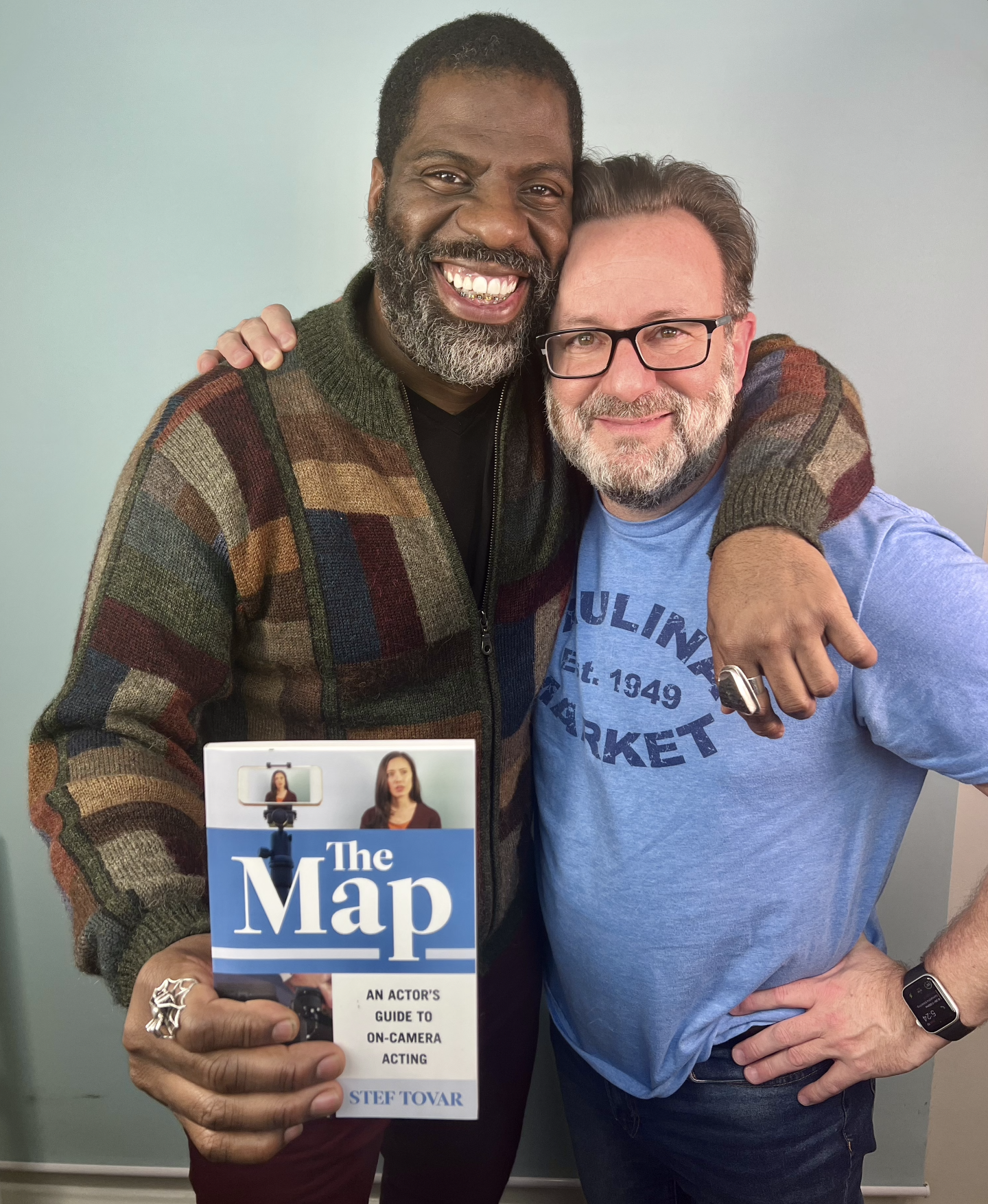 It's helped hundreds of actors and artists book more jobs. (Here with the rapper and artist Rhymefest)