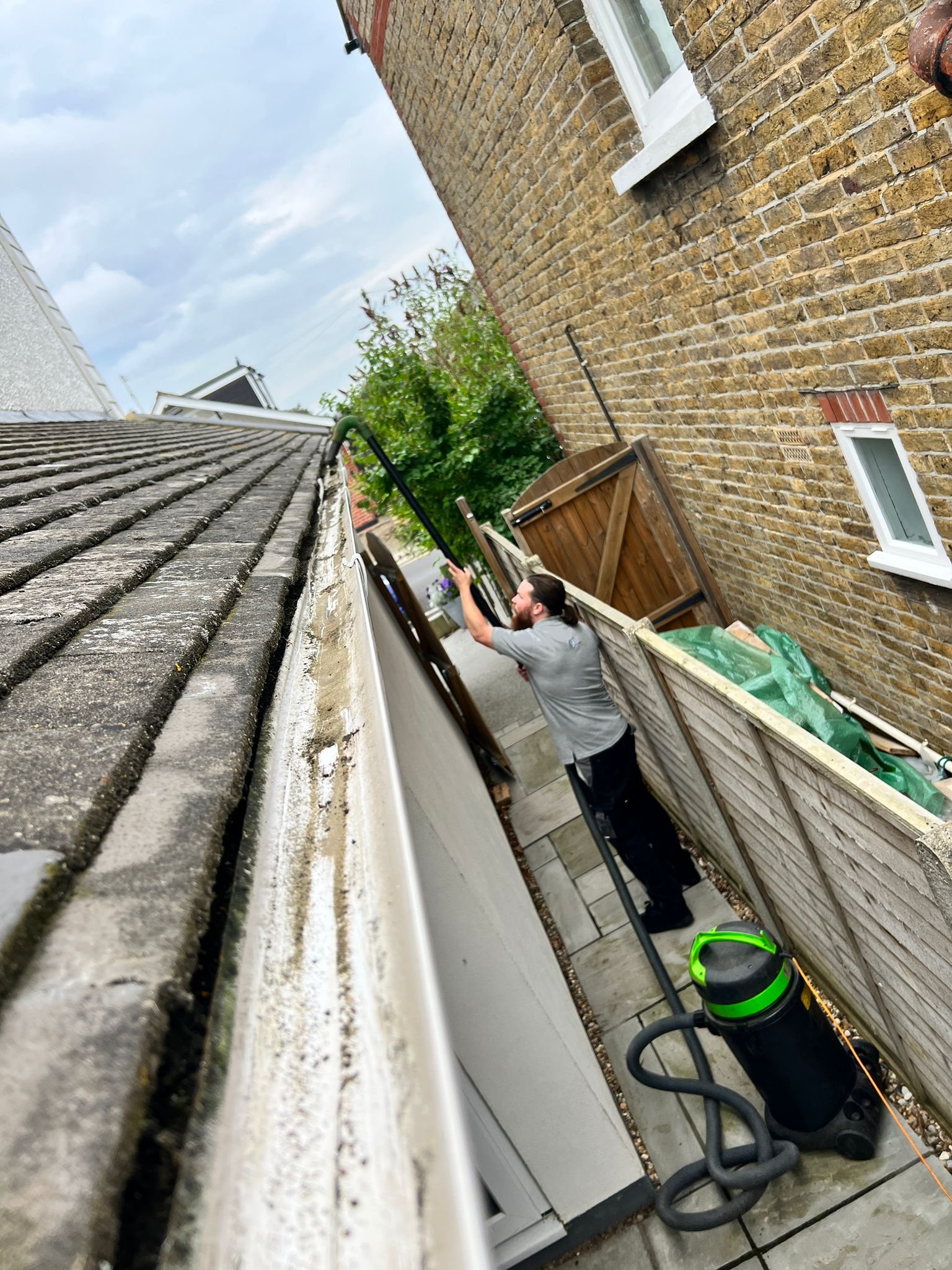 Gutter vac being used from ground level