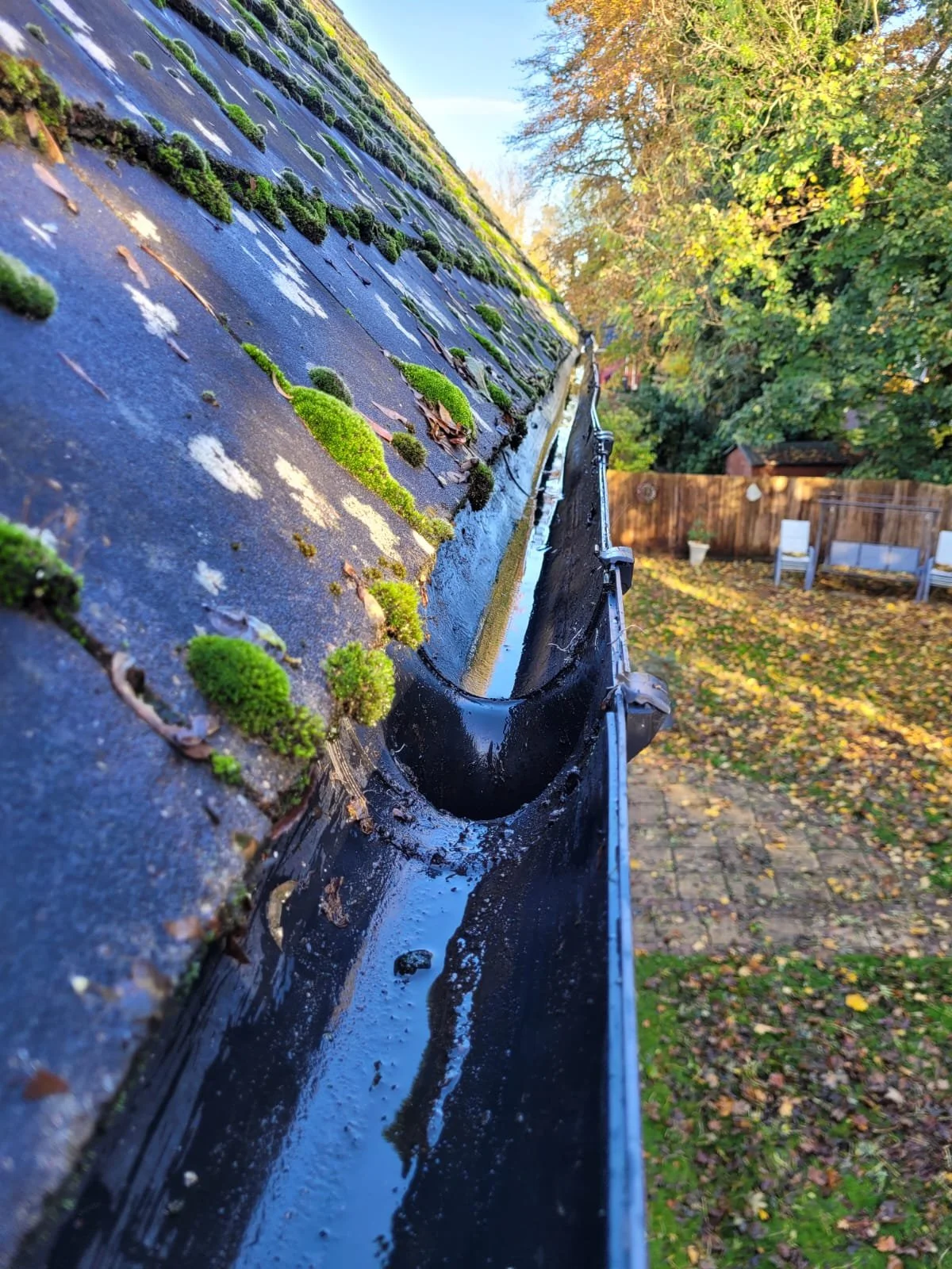 Clear gutter empty of vegetation