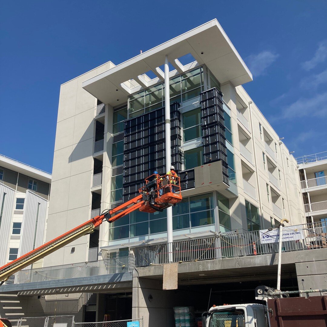 The kind of photos we LOVE to get from a contractor: Scaffolding is down and rainscreen panels are going up at our Iamesi Village project in downtown San Jose.