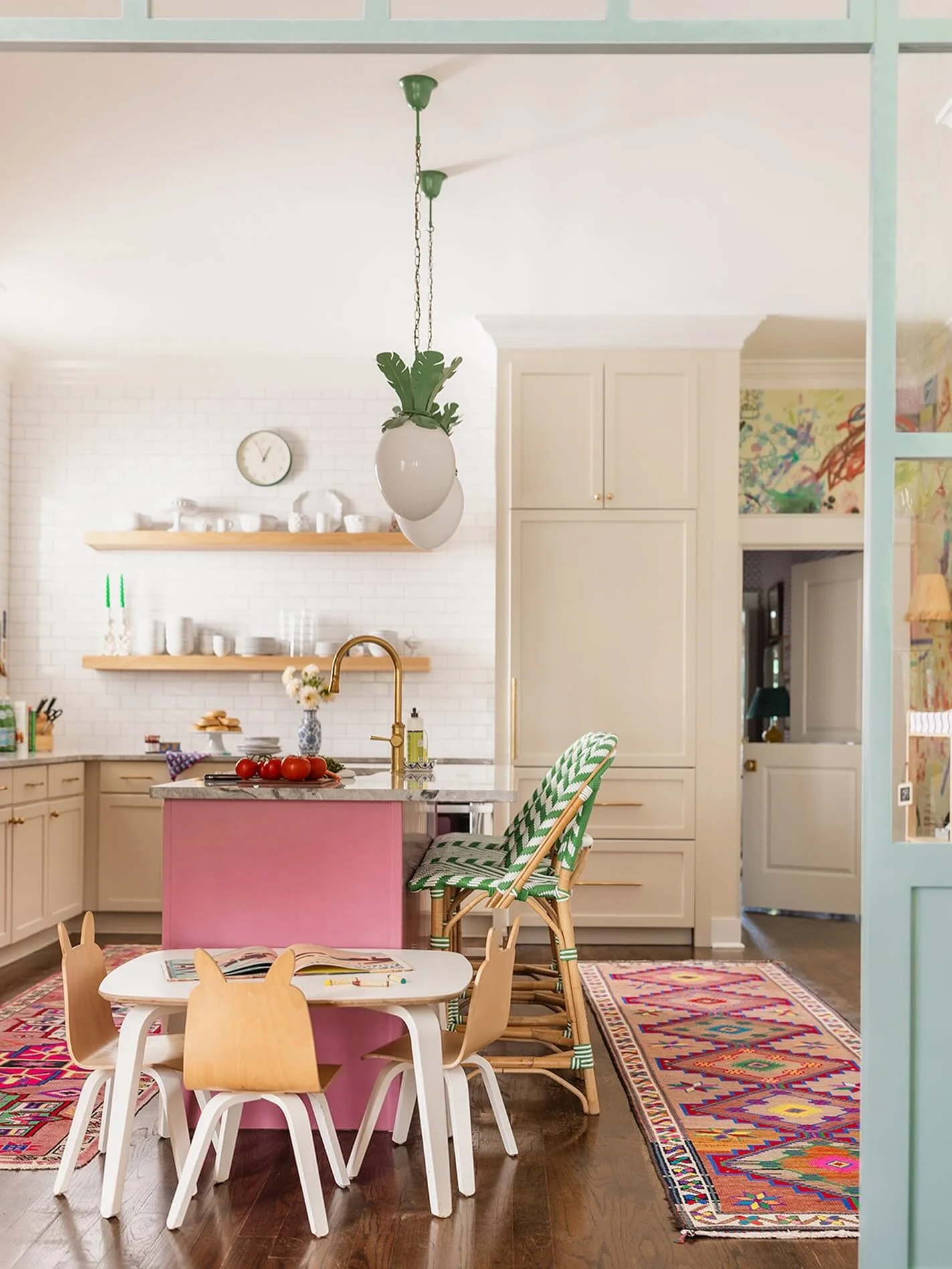 When we updated our kitchen, we prioritized the things that mattered most: keeping the original cabinets and countertops to stretch our budget (but painting said cabinets), but splurging on unlacquered brass hardware, appliance upgrades, and (my drea