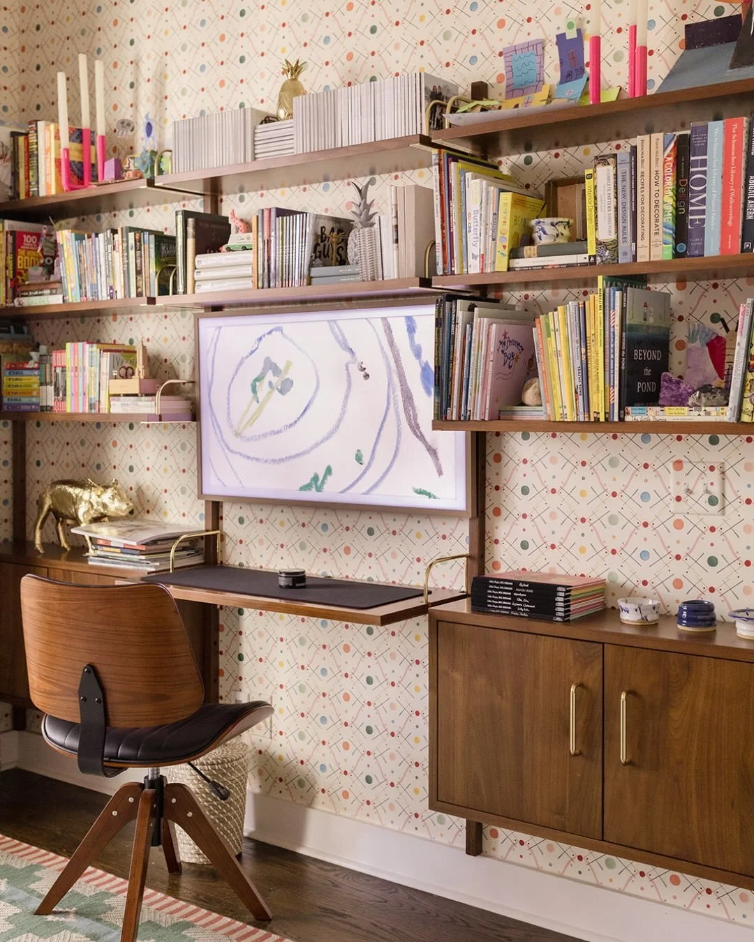 Real life vs. the internet, round 2. 
This room has been seen in The New York Times, Apartment Therapy, and more. It&rsquo;s our back den that serves as Chris&rsquo;s office by day and video game hang + tween sleepover central on weekends. Swipe to s