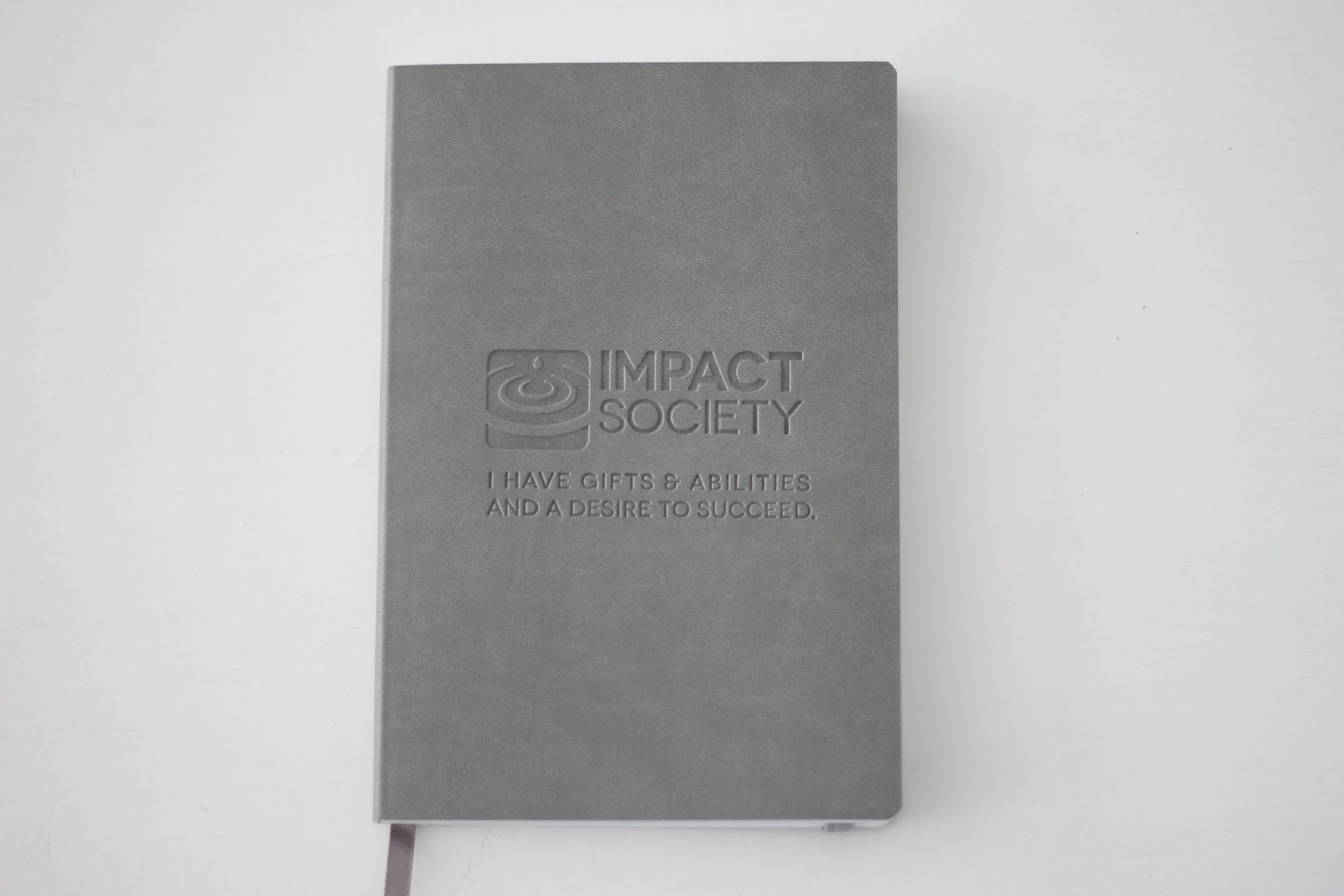 Journalling for a good cause, all proceeds support Impact Society's programs for youth mental health.