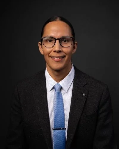 Jonathan Kaiswatum,  advisor of Impact Society's Reconciliation Through Education Program.