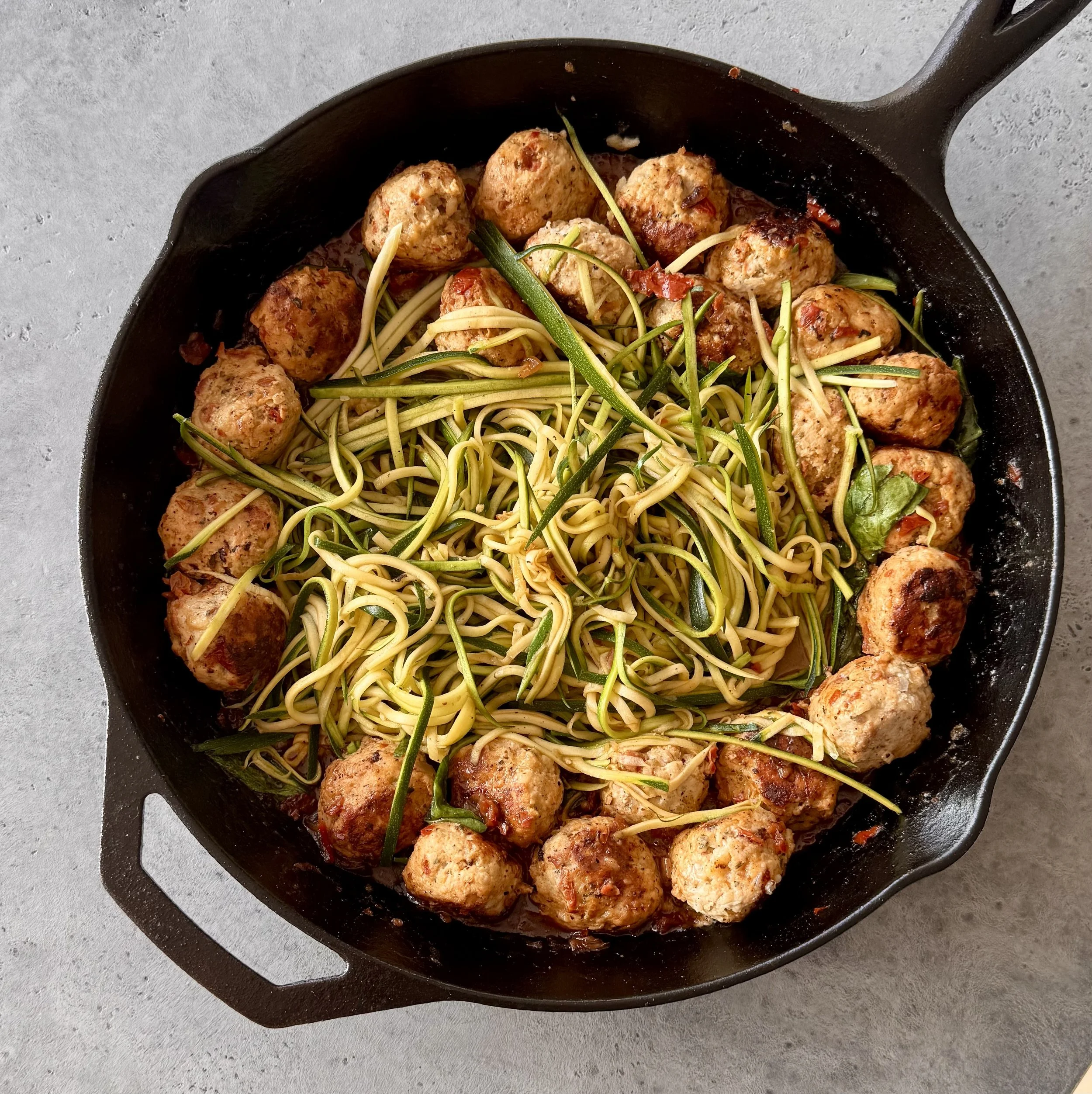Tuscan Chicken Meatballs with Zucchini Noodles