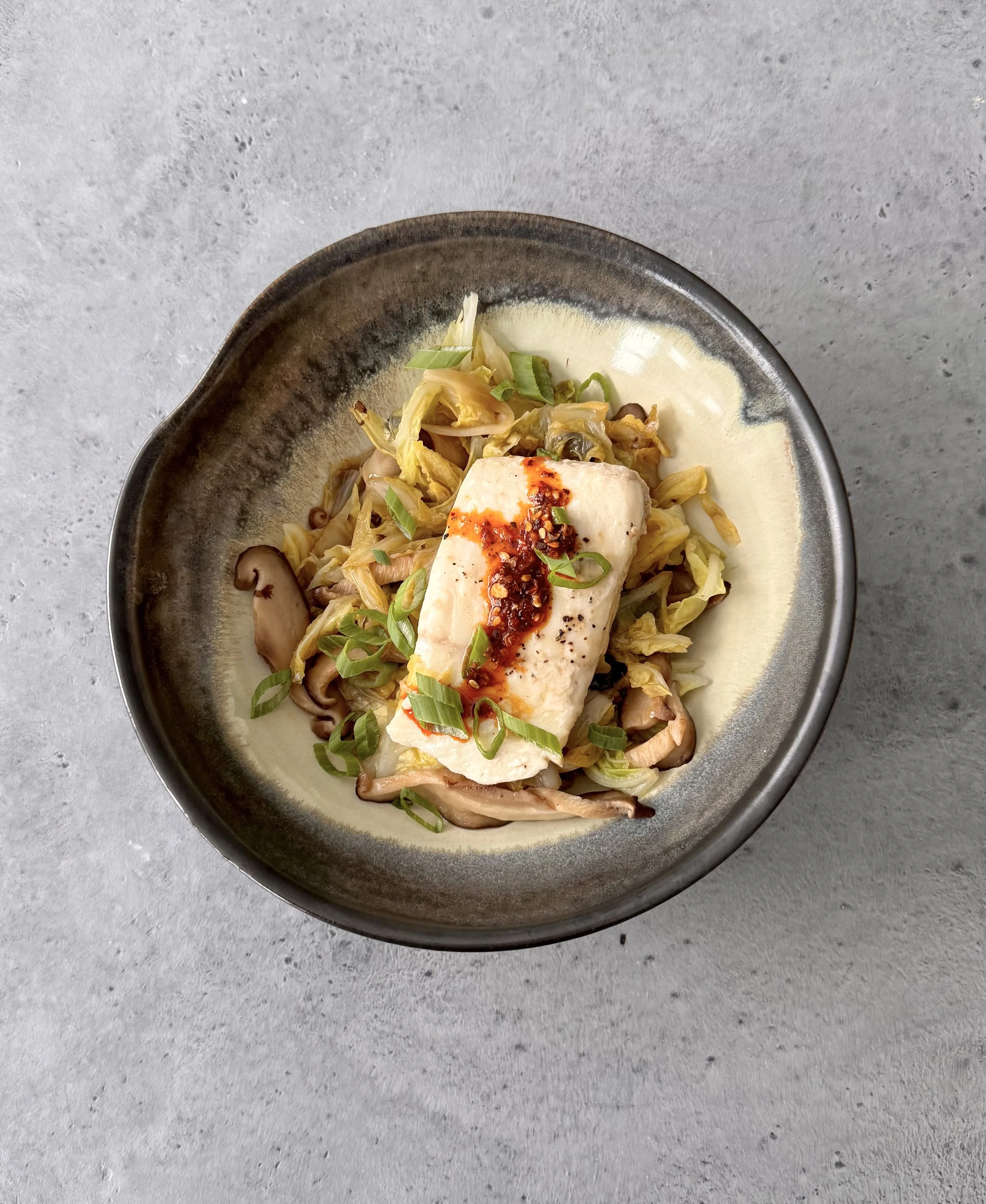 Ginger-Braised Halibut with Napa Cabbage and Shiitakes