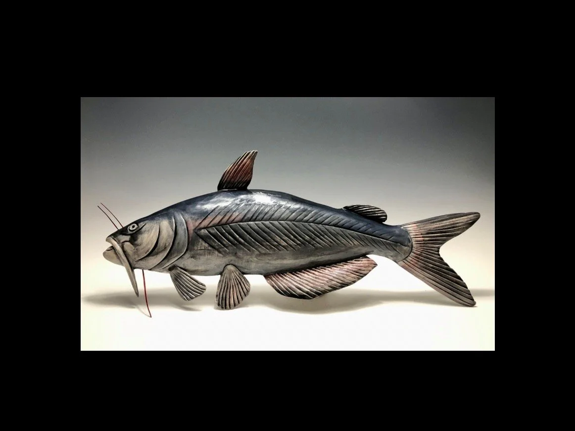 Catfish - Hand Sculpted Raku Low Fire Sculpture with Underglaze
17x7"
Additional Fish Available