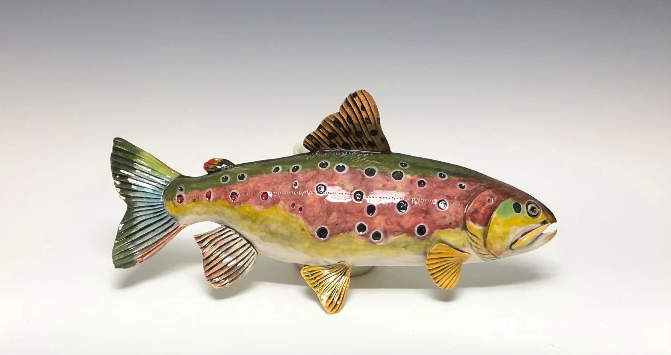 Trout - Hand Sculpted Raku Low Fire Sculpture with Underglaze
16x7"
Additional Fish Available