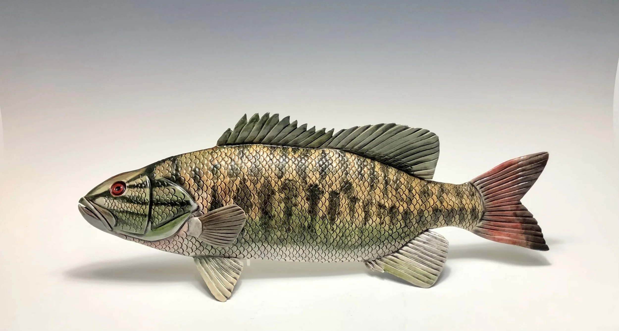 Large Mouth Bass - Hand Sculpted Raku Low Fire Sculpture with Underglaze
17x7"
Additional Fish Available