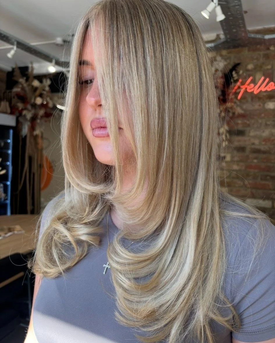 Full head babylights, the secret to that sun-kissed, soft blonde glow 🌞

This blend is all about keeping it natural, seamless and effortlessly fresh ✨ using our salon faves @wellahair @sebastianpro_official &amp; @ghdhair 💛

📸 by @hairbymadisonmea