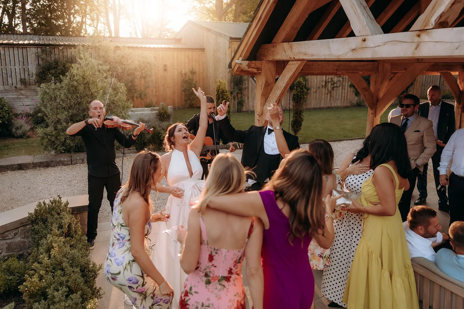 Wedding guests dancing outside at Wyresdale Park
