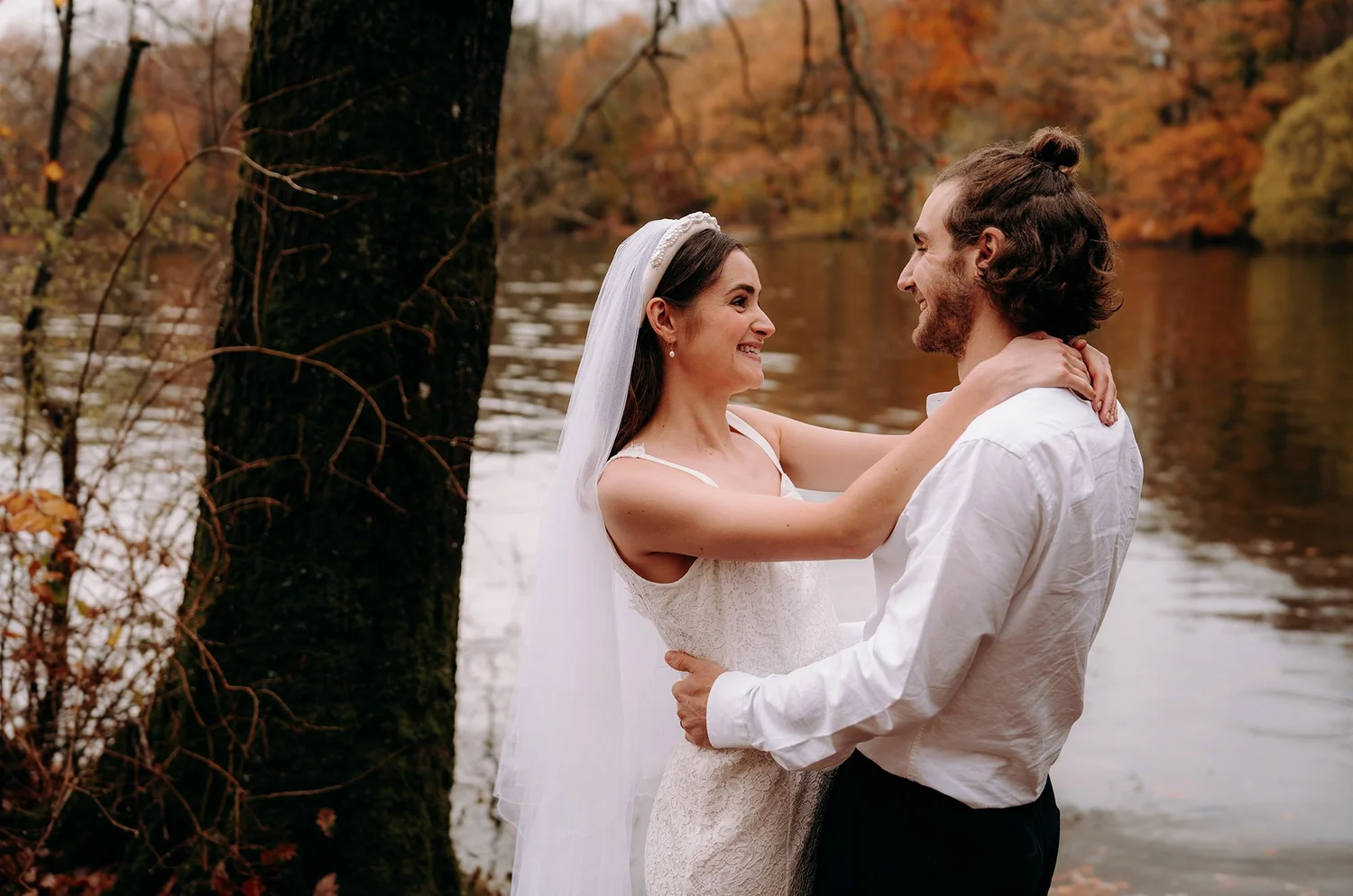 Newlyweds beside Lake Windermere at Cragwood