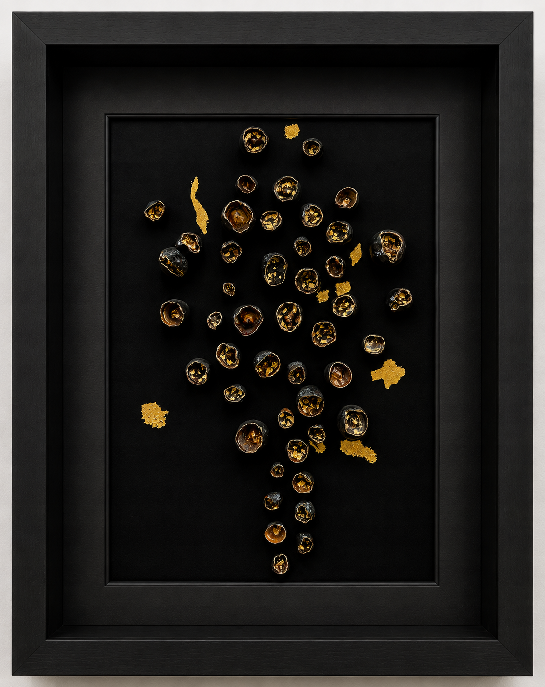 This sculptural relief, "Hidden Treasures", explores the beauty found in unexpected places. Against an intensely black ground, dozens of hand-carves, biophillic vessels emerge in an organic, cascading arrangement. Their irregular forms reveal subtle 