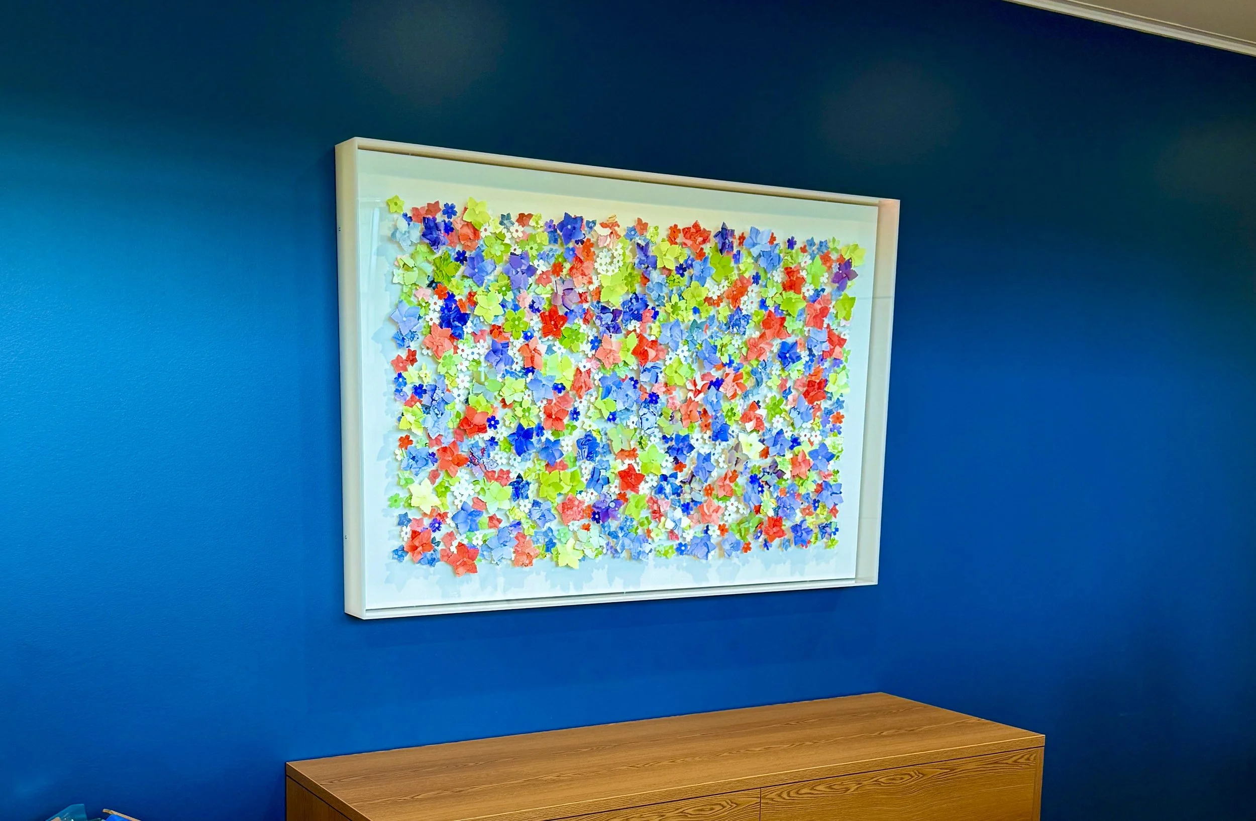 My first public art commission "Where the Meadow Breathes" was installed at the new Town Hall in Parker, Colorado. This beautiful and cherry custom floral relief piece greets staff and visitors from behind the welcome desk. 60x40x4.5 in a custom plex