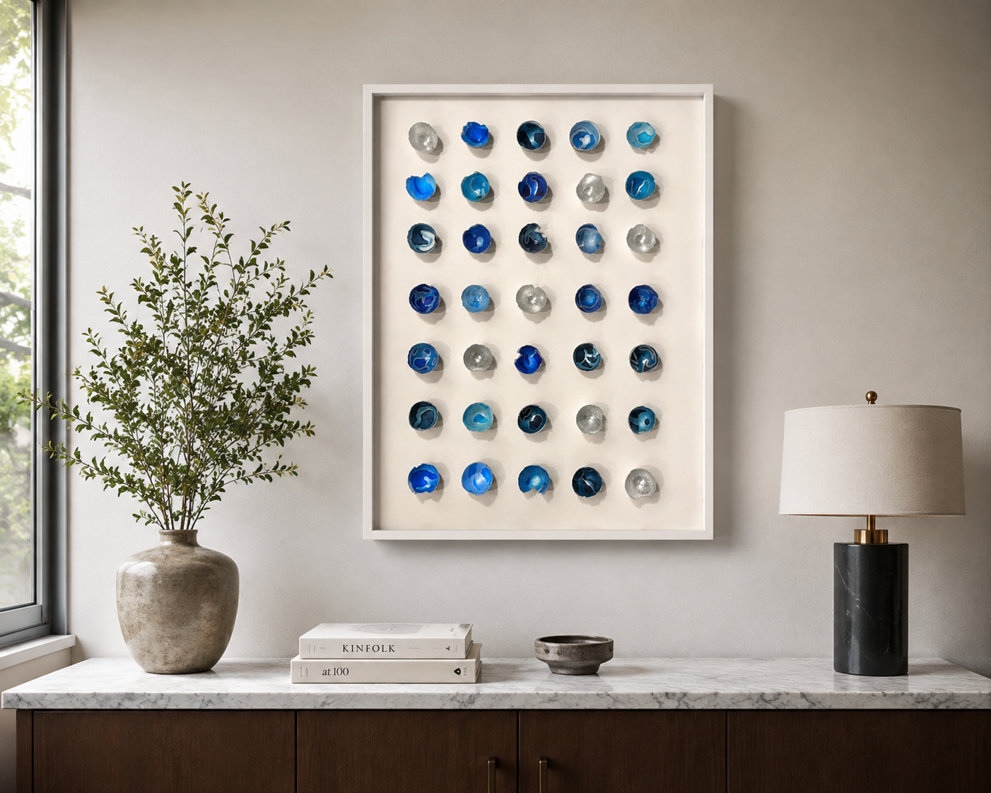 Silver Linings is a sculptural relief that transforms delicate eggshells into an exploration of fragility, resilience, and renewal. Inspired by the Japanese art of Kintsugi, which honors broken objects by emphasizing rather than concealing their impe
