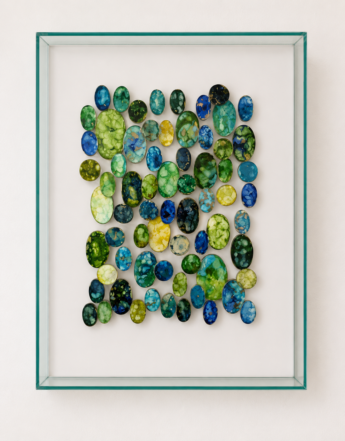 "Dipping in the Tide Pools" is an exploration of the vibrant, ever-changing world revealed along the shoreline. Inspired by the experience of looking closely into a tide pool, the work brings together an array of organic, pebble-like forms in luminou