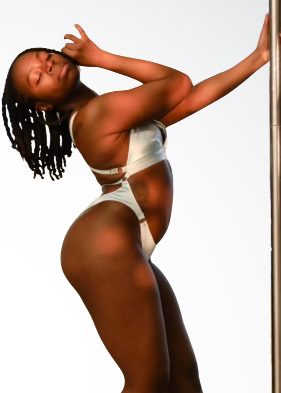 Tyller pole instructor in Harlem showcasing foundational pole movement and transitions at Full Circle