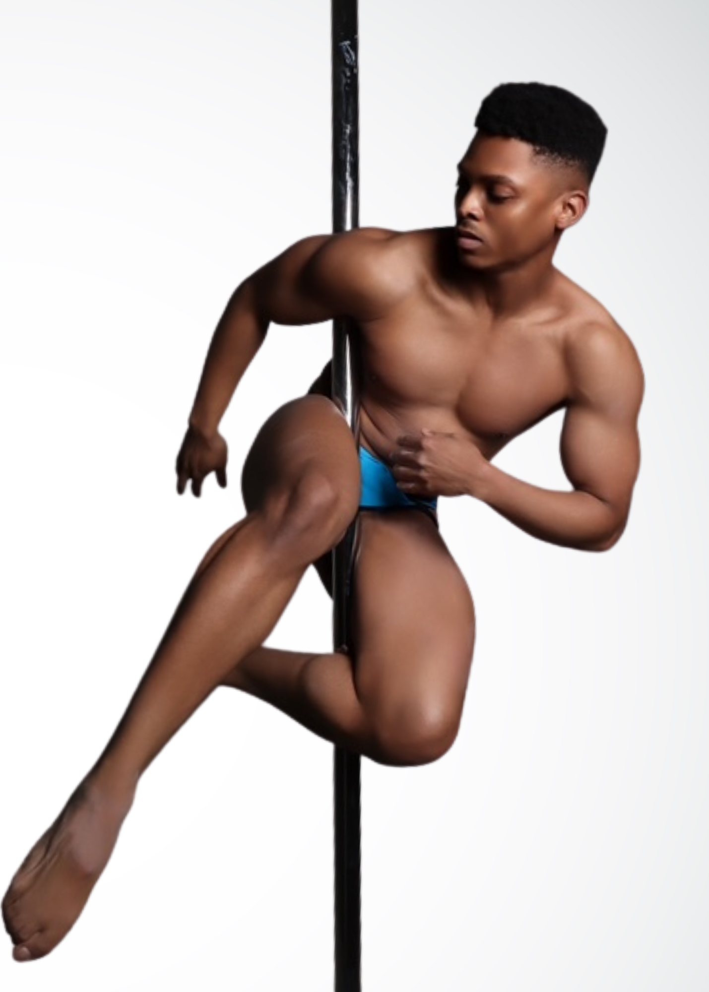 Slayquan pole instructor and performer in NYC showcasing fluid and confident pole movement at Full Circle