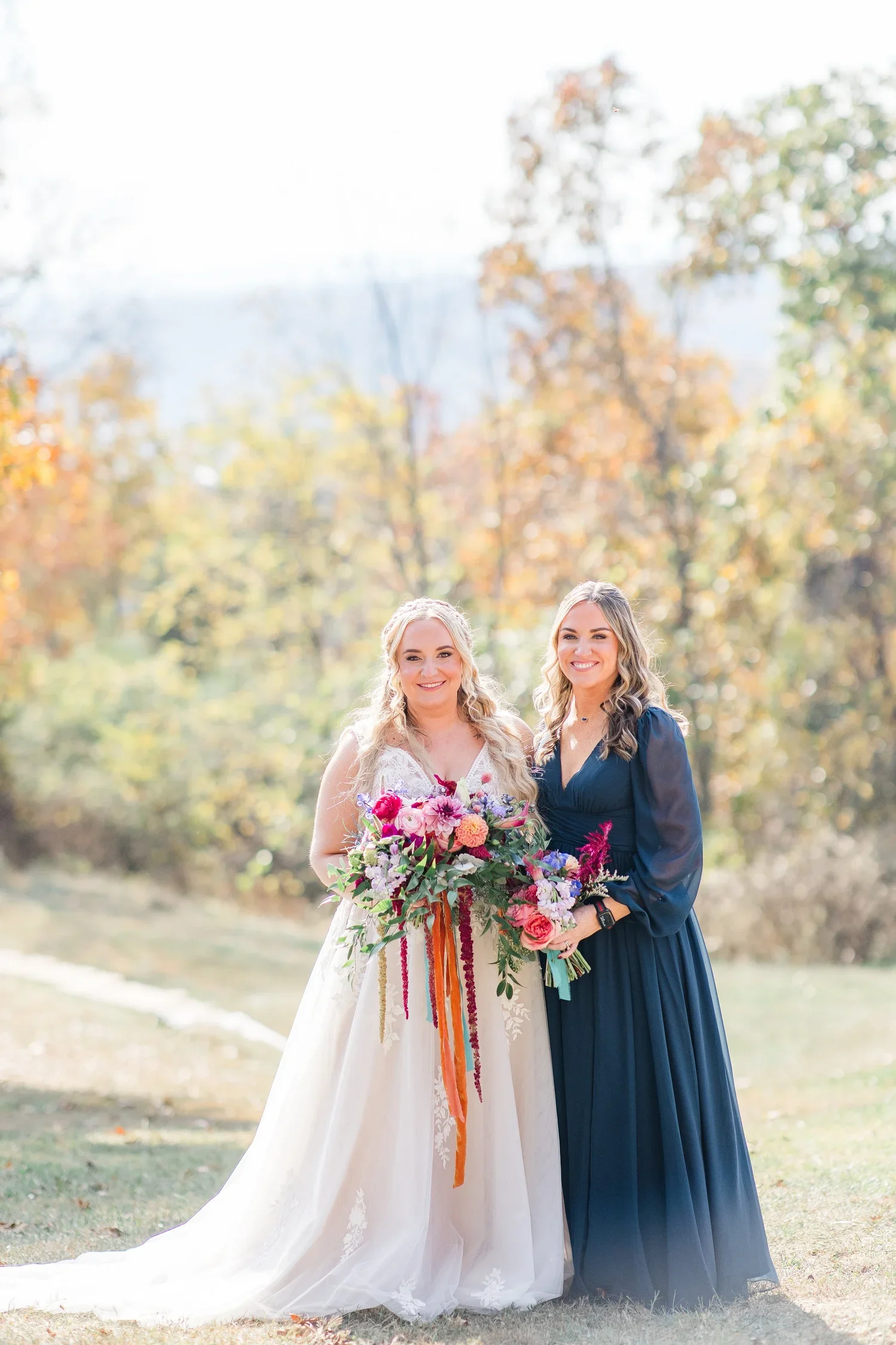 katelyn-workman-photography-grandview-cottages-wedding-237.jpg+Bride+n+girl-1.webp