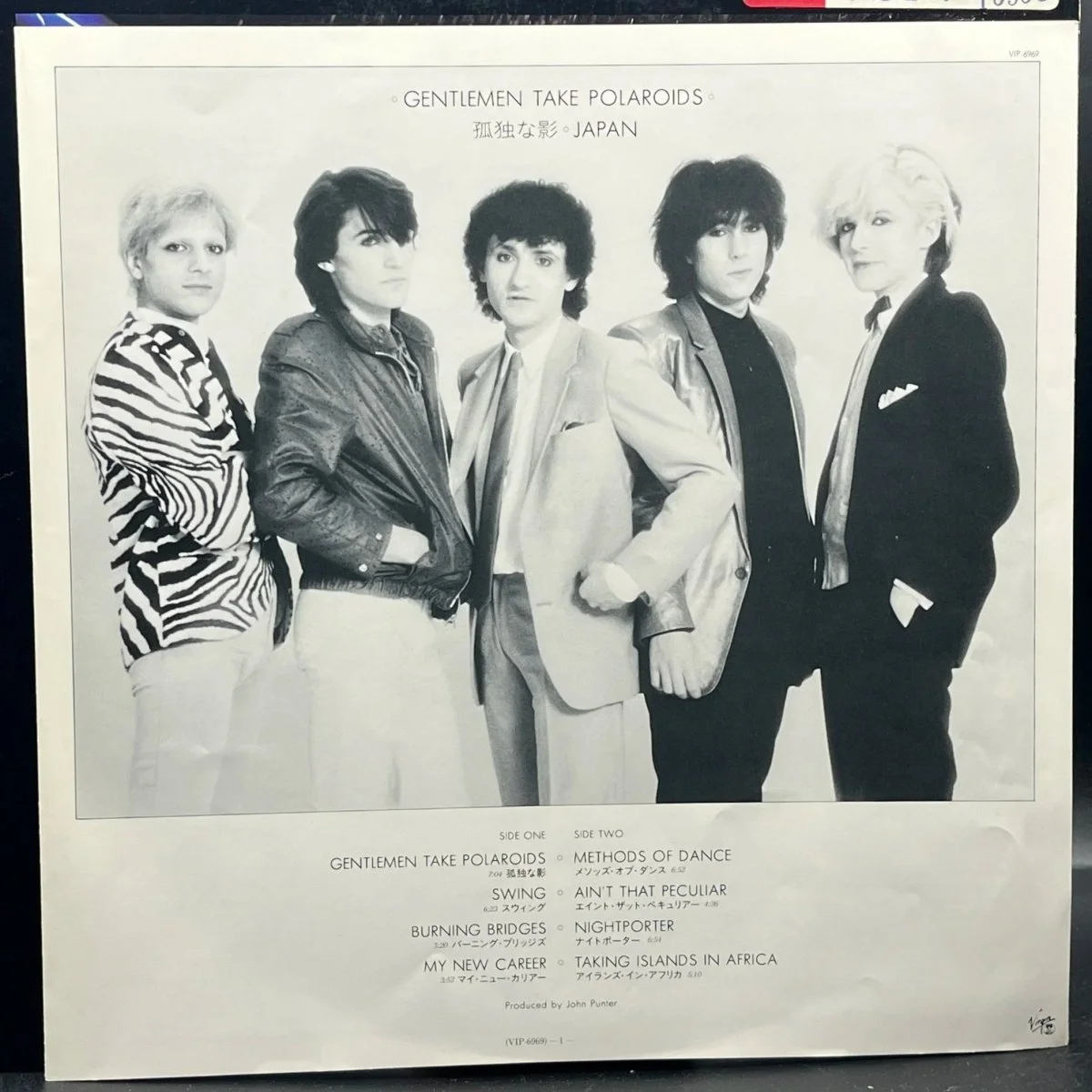 japan-gentlemen-take-polaroids-558088.jpg