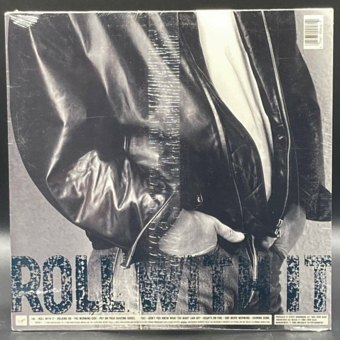 steve-winwood-roll-with-it-644831.jpeg